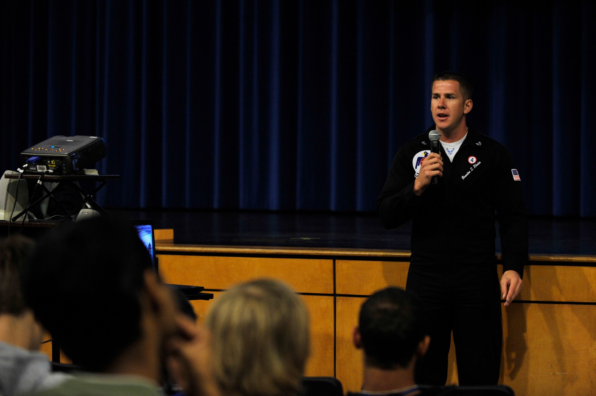 U.S. Air Force Staff Sgt. Brandon Rhodes, U.S. Air Force Air Demonstration Team "Thunderbirds" dedicated crew chief, speaks to students about Air Force opportunities at Sumter High School, Sumter, S.C., May 4, 2012.  Rhodes and the other Thunderbirds team members are visitng the community around Shaw Air Force Base, S.C. in addtion to performing at the Shaw Air Expo May 5 and 6.(U.S. Air Force photo by Airman Nicole Sikorski/Released)
