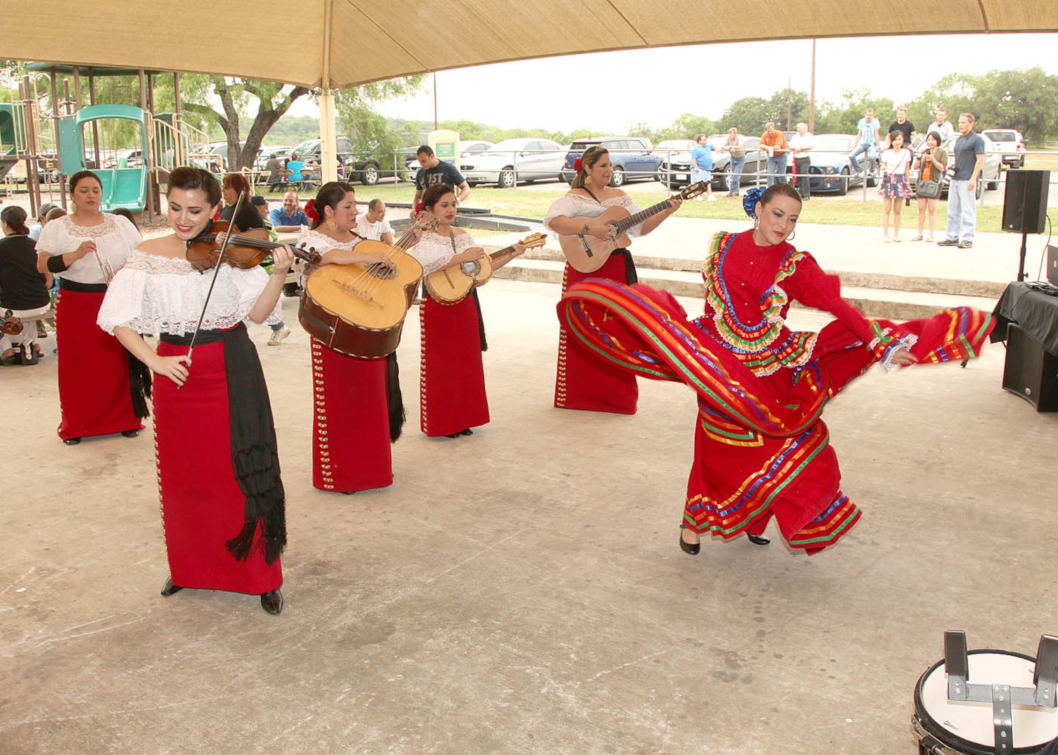 Mariachi Las Coronelas performs at the Defense Language Institute English Language Center's annual picnic April 13 at the Stillman Park pavilion. (U.S. Air Force photo/Robbin Cresswell)