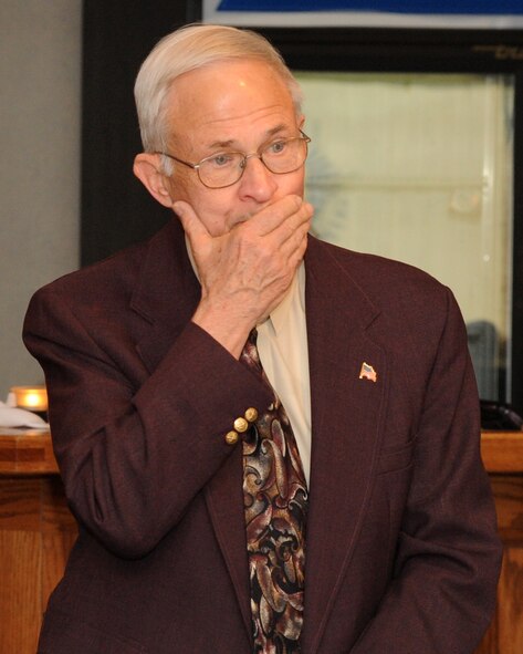 Jim Bradshaw, an honorary ambassador to Grand Forks Air Force Base, N.D., learns that he was made an honorary chief master sergeant during an April 26, 2012, dinner on the base. (U.S. Air Force photo by Airman 1st Class Navarro)   