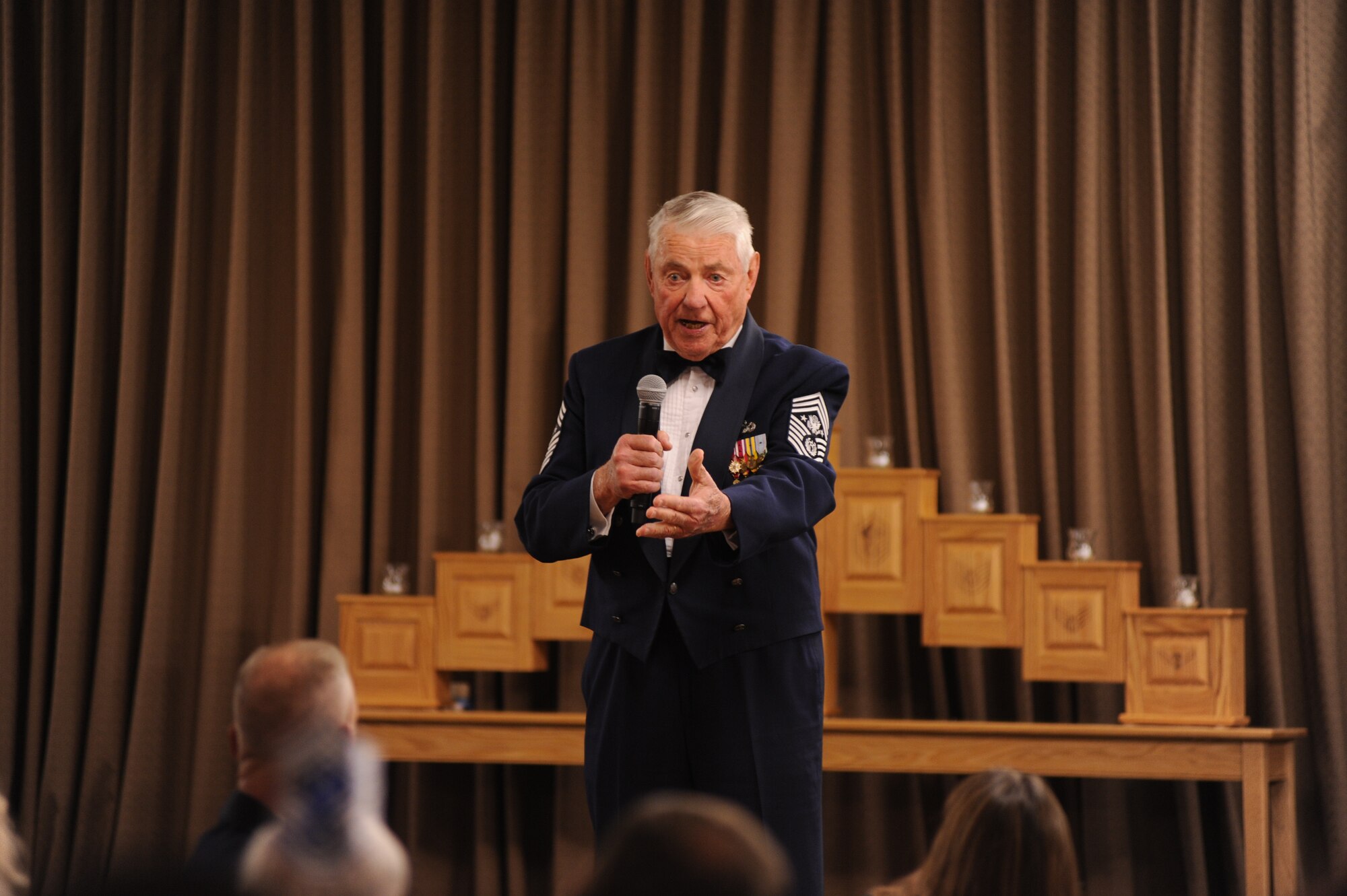 Retired Chief Master Sgt. Robert Gaylor, the fifth Chief Master Sergeant of the Air Force, delivers an inspirational speech during the Chief’s Recognition Ceremony on Grand Forks Air Force Base, N.D., on April 27, 2012. Chief Master Sgt. Christopher Crafton, 319th Civil Engineer Squadron, and Jim Bradshaw, an honorary ambassador for the base, were honored at the ceremony. (U.S. Air Force photo by Staff Sgt. Amanda N. Grabiec)
