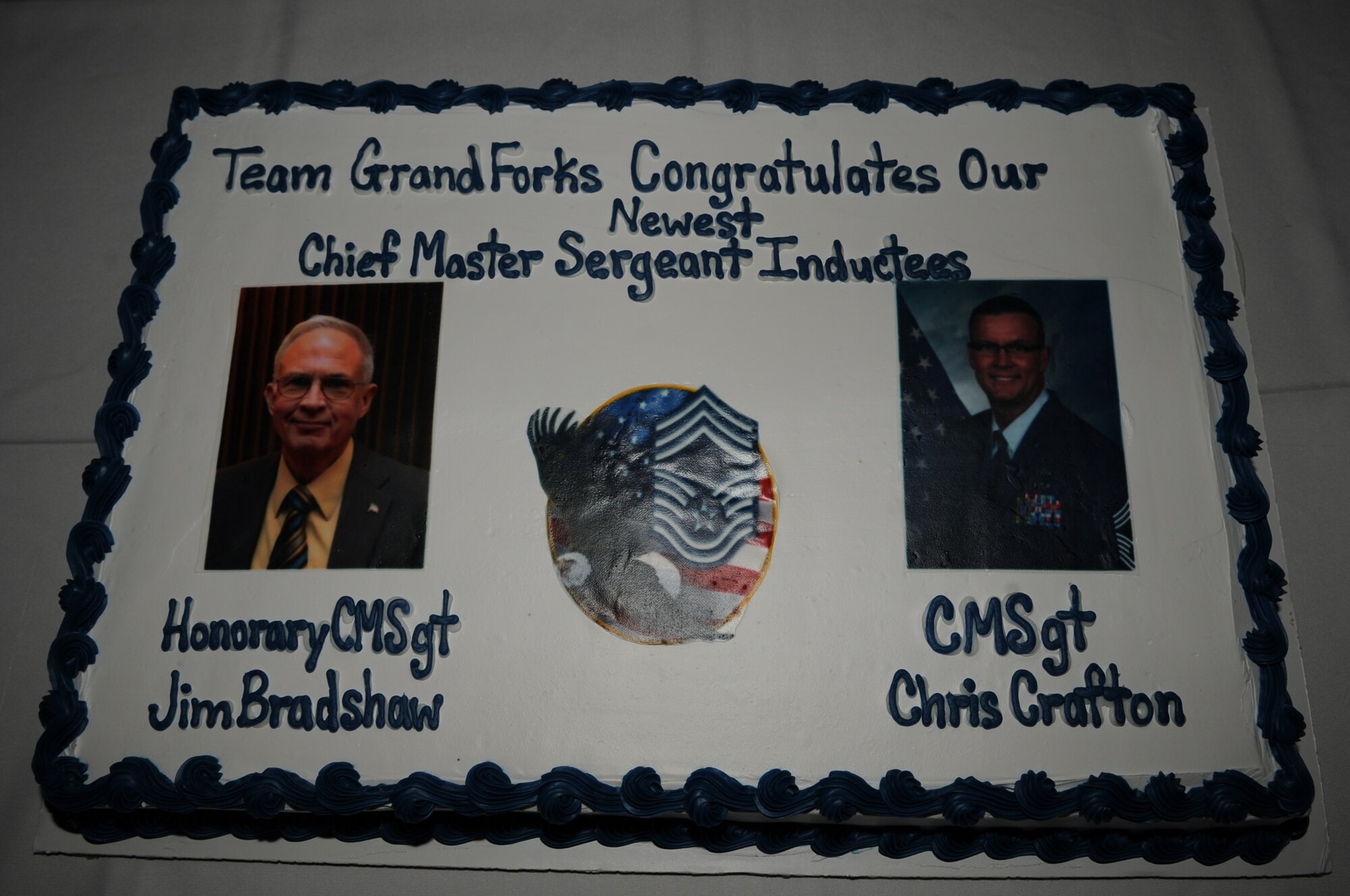 Chief Master Sgt. Christopher Crafton and Jim Bradshaw were named the newest chief master sergeants at Grand Forks Air Force Base, N.D., during an April 27, 2012, Chief’s Recognition Ceremony at the club. (U.S. Air Force photo by Staff Sgt. Amanda N. Grabiec)