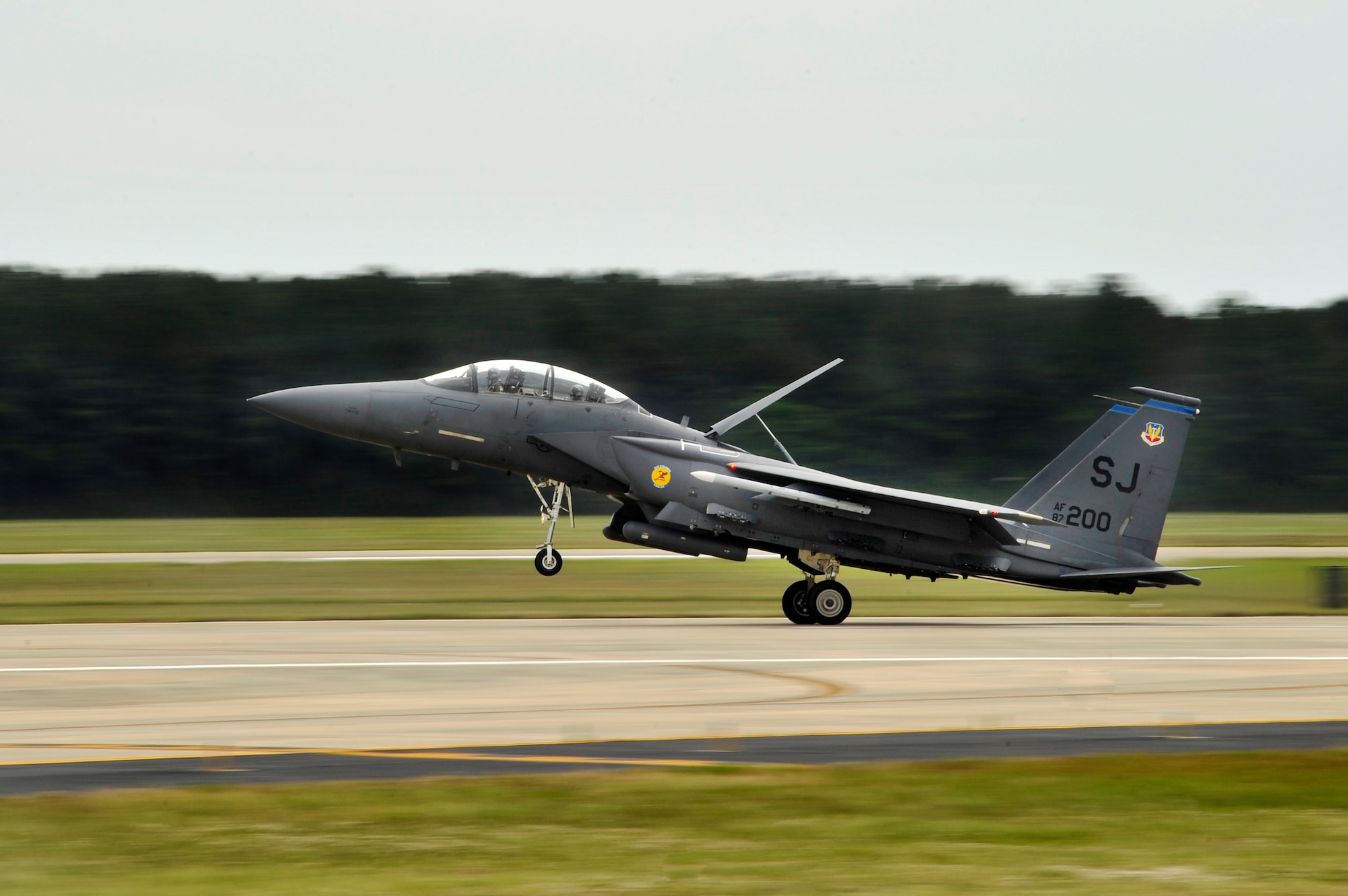 A U.S. Air Force F-15E lands on the Shaw flightline after a flight demonstration during day one of the Shaw Air Expo, May 4, 2012, Shaw Air Force Base, SC. The Shaw Air Expo kicked off here today giving military members and their families a chance to witness several aircraft performances. Day 2 and 3 of the Air Expo will take place May 5 through 6 and will be open to the public. (U.S. Air Force Photo by Senior Airman Kenny Holston/Released)


