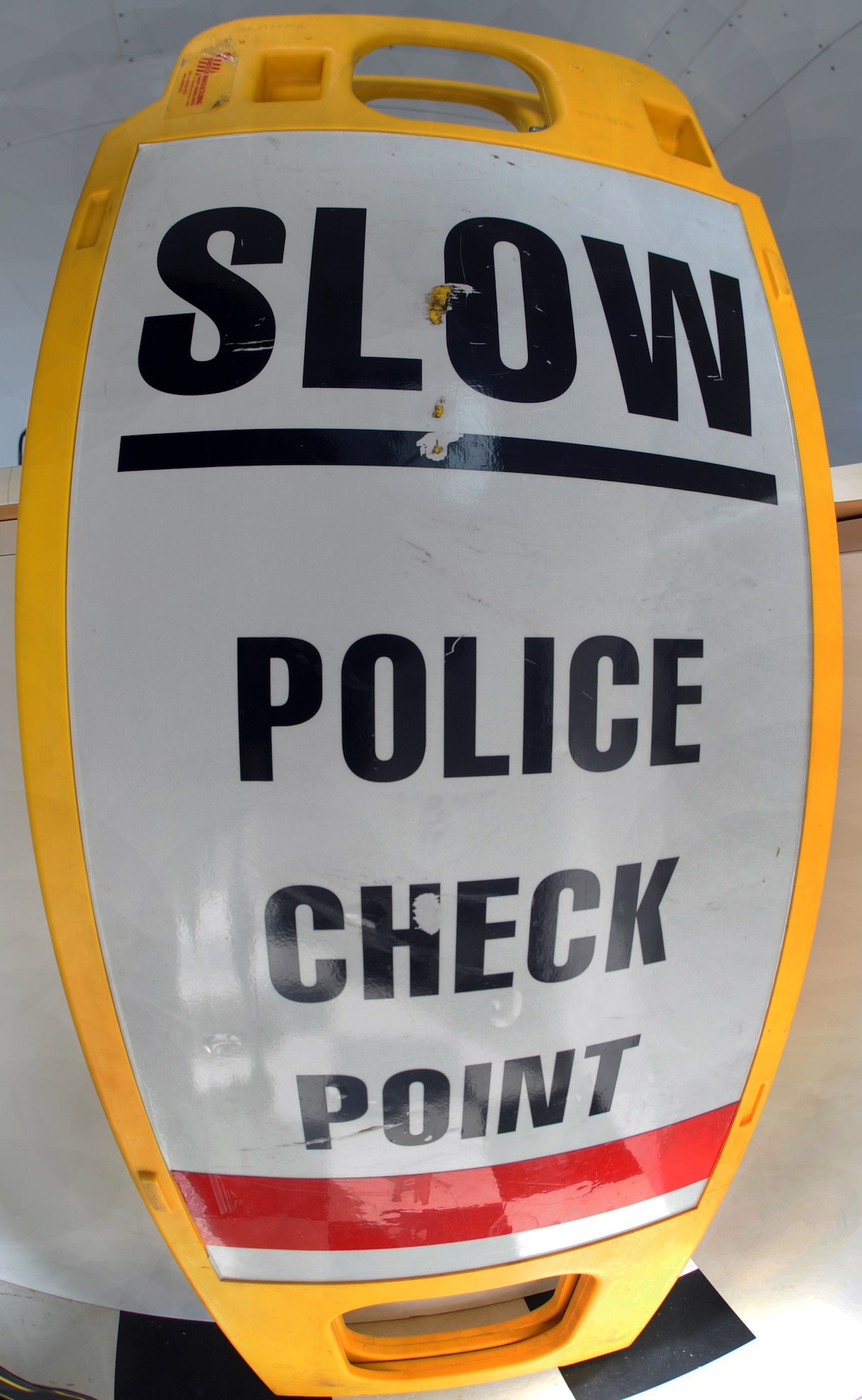 This sign is used during roadblocks to warn drivers to slow down and prepare for an inspection by law enforcement officers in Lowndes County. The inspection is used to keep roads safer and ensure drivers follow laws that are set by the State of Georgia.