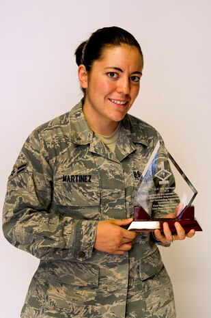 Airman 1st Class Jodi Martinez poses for a photo with her Diamond Sharp
award at Joint Base Charleston May 2. The Diamond Sharp recipients were
Airman 1st Class Jodi Martinez, 1st Combat Camera Squadron, Airman 1st Class
Robert Ealey, 437th Aerial Port Squadron, 437th Airlift Wing, and Senior Airman
Joshua Nelson, 15th Airlift Squadron, 437th AW. The Diamond Sharp
awardees are Airmen chosen by their first sergeants for their excellent
performance. (U.S. Air Force photo/Airman 1st Class George Goslin)
