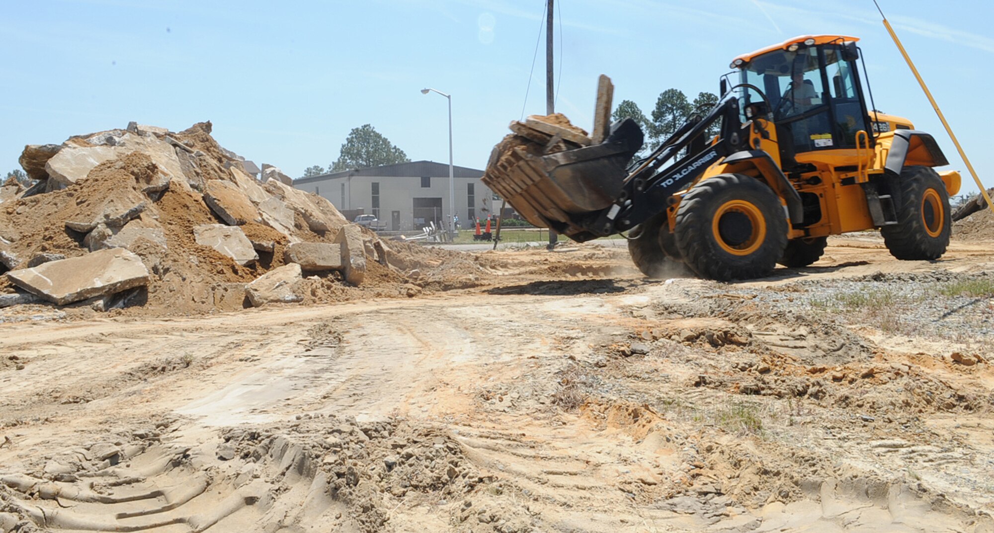 Airmen from the 4th Civil Engineer Squadron work on a construction project in tent city on Seymour Johnson Air Force Base, N.C., May 3, 2012. This project began at the beginning of May and 4th CES leadership expects it to be complete by the beginning of July. (U.S. Air Force photo/Airman 1st Class Aubrey Robinson/Released)