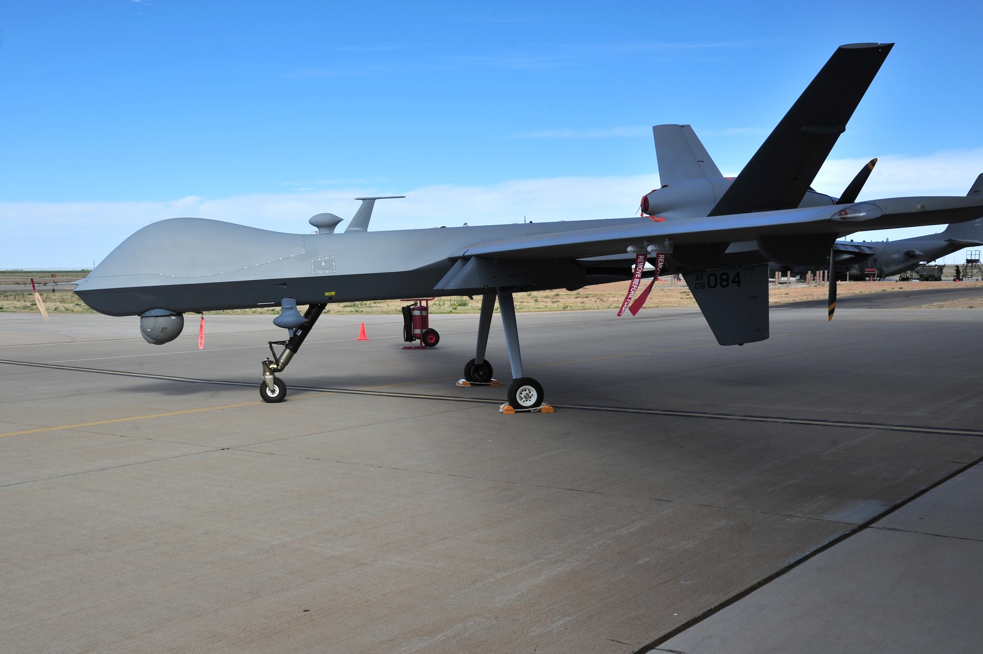 An MQ-9 Reaper sits on the flightline at Cannon Air Force Base, N.M., May 3, 2012. Reapers are remotely piloted aircraft that perform multiple missions such as gathering intelligence and assisting in combat search and rescue. (U.S. Air Force photo by Airman 1st Class Xavier Lockley) 