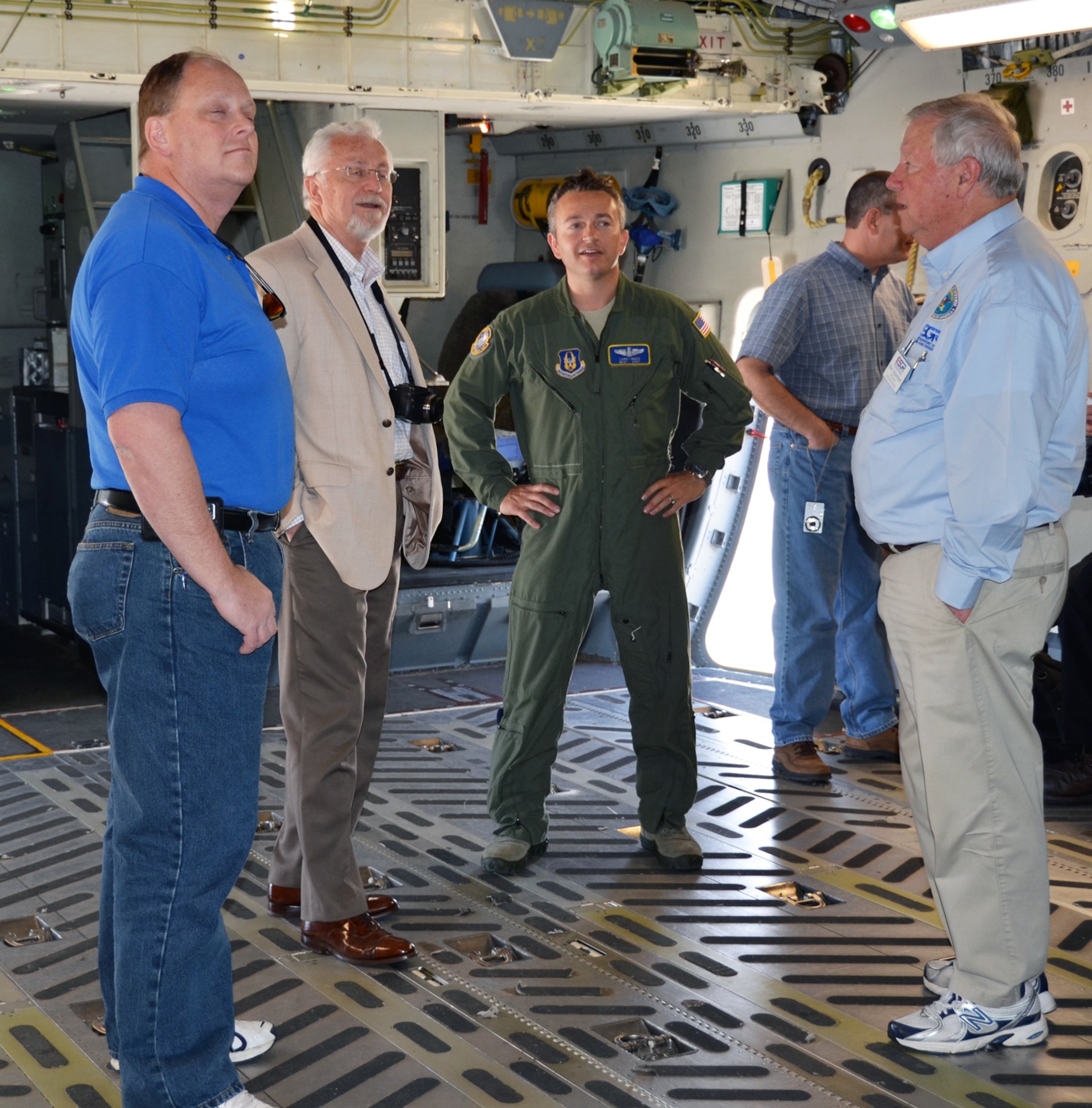 WRIGHT-PATTERSON AIR FORCE BASE, Ohio - Master Sgt. Larry Unger, 89th Airlift Squadron loadmaster, explains the ins and outs of a 445th Airlift Wing C-17 Globemaster III to employers from North Carolina taking part in a civic leader tour to Wright-Patterson Air Force Base, Ohio, April 19 and 20. The group, sponsored by the 916th Air Refueling Wing, and the NC Employer Support of the Guard and Reserve, toured various 445th AW units and the Air Force Research Lab during their 2-day visit here. (U.S. Air Force photo/Stacy Vaughn)
