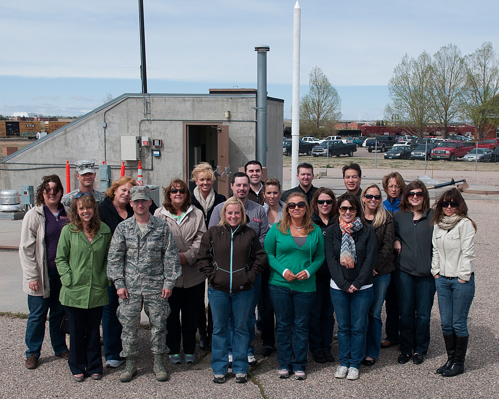 Members of the Cheyenne Leadership Program class pose for a photograph at Uniform-01, the missile maintenance training facility, during a visit to F. E. Warren Air Force Base, Wyo., April 27. (U.S. Air Force photo by R.J. Oriez)