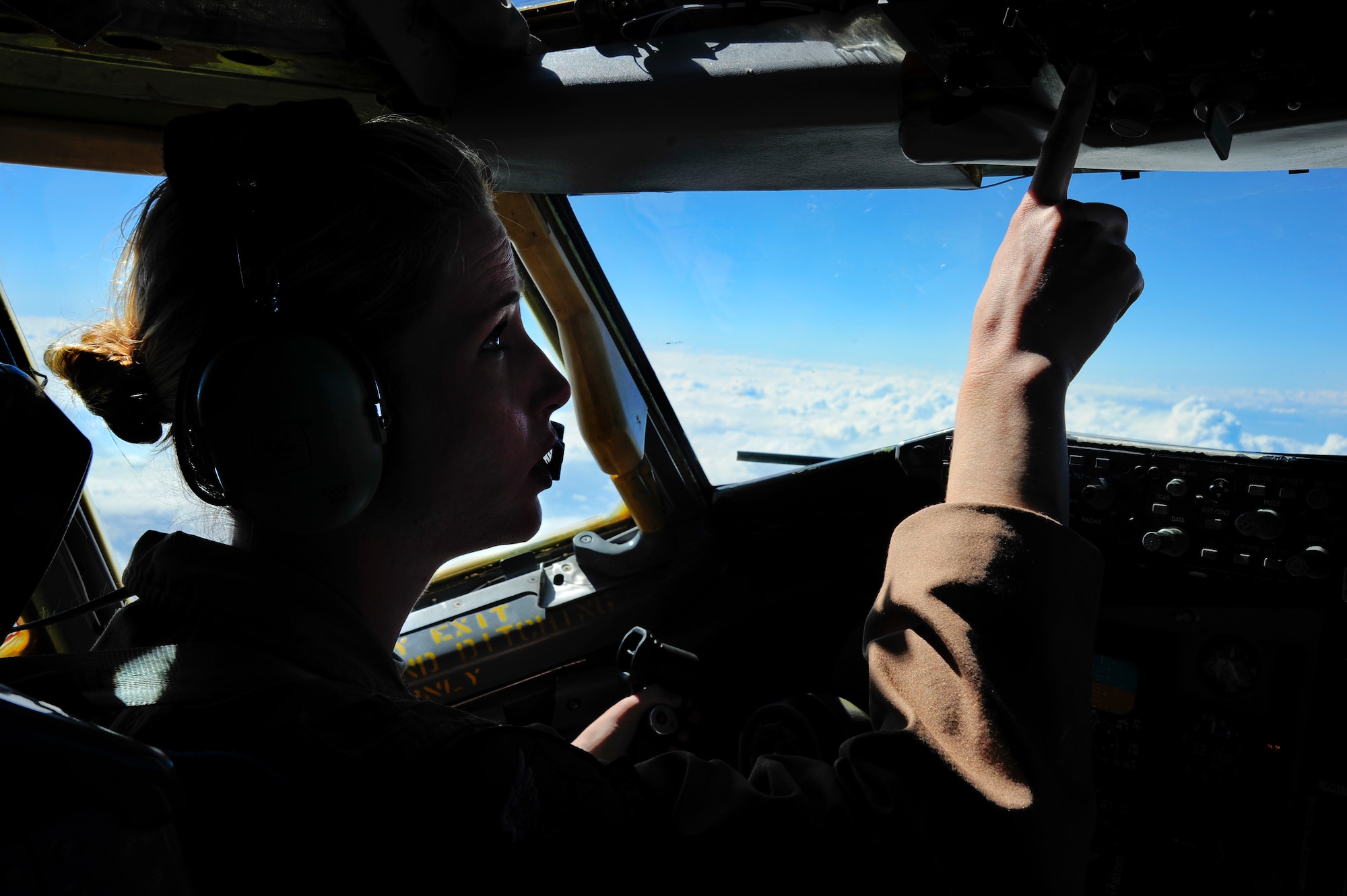 Capt. Tanya Dubiel commands a KC-135 Stratotanker assigned to the Transit Center at Manas, Kyrgyzstan, May 4, 2012, over Afghanistan during the 22nd Expeditionary Aerial Refueling Squadron's 25,000th flight. Dubiel is a 22 EARS KC-135 pilot deployed to the Transit Center at Manas, Kyrgyzstan, from Fairchild Air Force Base, Wash (U.S. Air Force photo/Staff Sgt. Angela Ruiz)