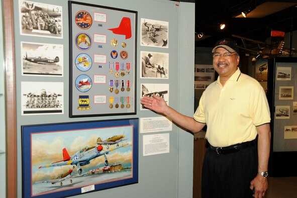 Pausing to look at an exhibit honoring the Tuskegee Airmen who served at Selfridge Field during World War II, Lt. Gen. (ret.) Daniel James III, former director of the National Guard Bureau, made a visit to the Selfridge Military and Air Museum at Selfridge Air National Guard Base, Mich., May 3, 2012. James was at the base to speak at two leadership training courses. James’ father, the late Gen. Daniel James Jr., was a member of the Tuskegee Airmen and received his pilot training at Selfridge. (U.S. Air Force photo by John S. Swanson)