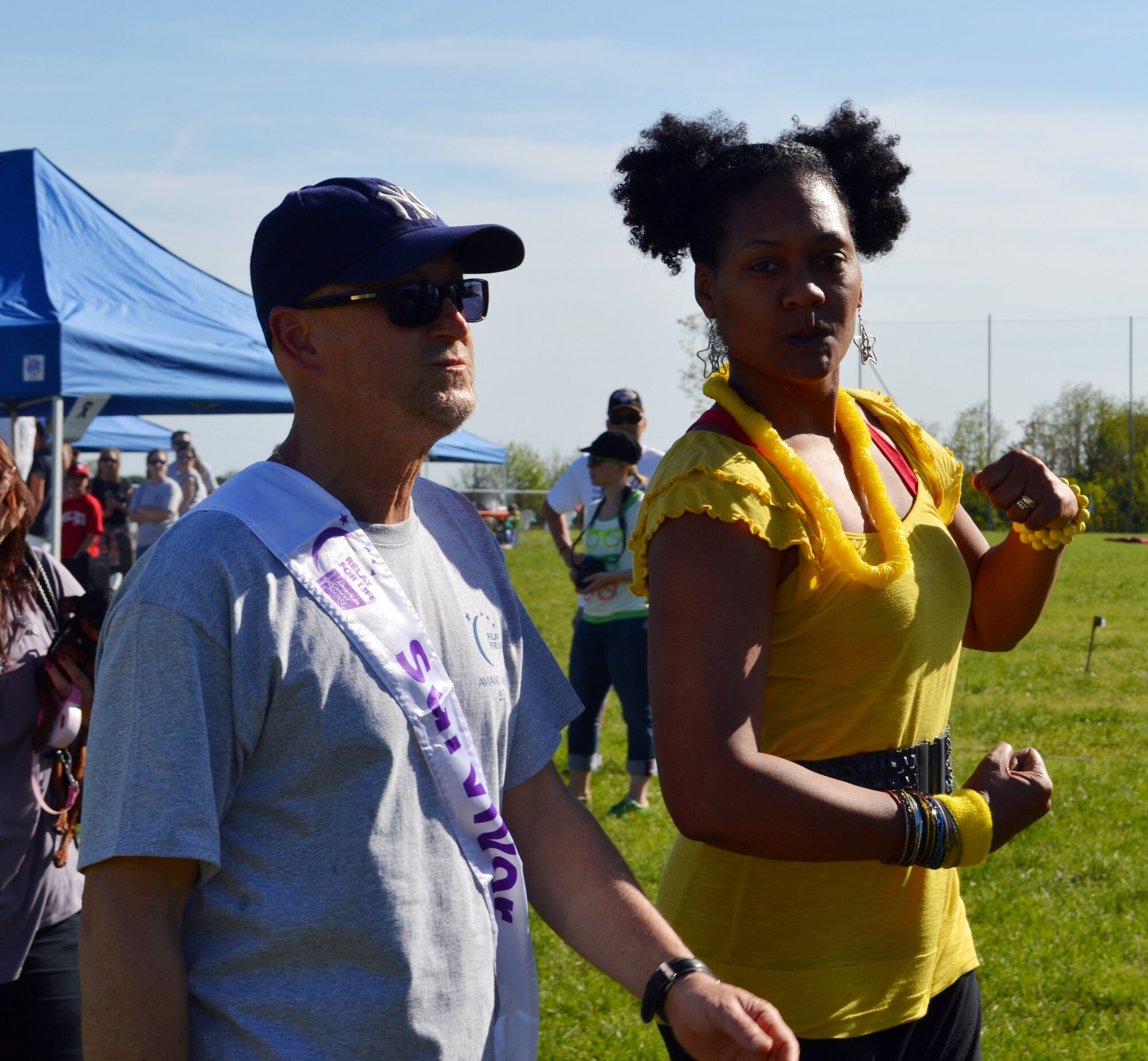 (From left) Sergio Zanuttigh and his wife Staff Sgt. Kristi Craft walk the survivor lap with his wife SSgt Kristi Craft,  at a Relay For Life event April 28 at Aviano Air Base, Italy. Aviano's Relay For Life raised over $14,000 this year, exceeding this year’s goal. Although the main objective of Relay For Life is to raise money for cancer research and cancer patients, the event is held to spread cancer awareness, celebrate the lives of survivors, remember those who lost their lives to cancer, and unite a community in the fight against cancer. (U.S. Air Force photo/Senior Airman Amber Swearengin)

