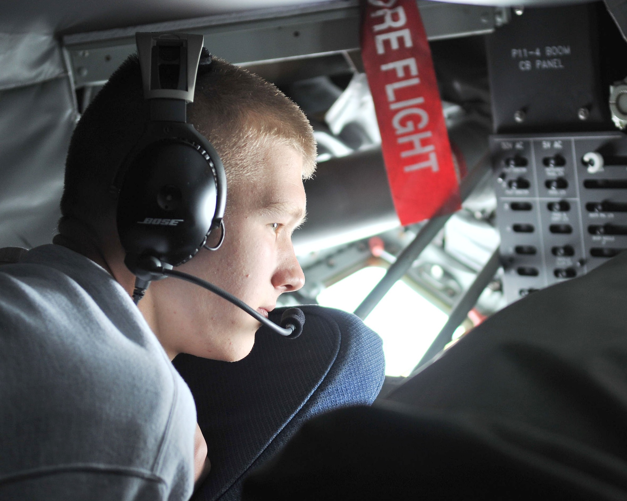 RAF MILDENHALL, England – Air Force Junior Reserve Officer Training Corps cadet Pavel Karamshin, son of Master Sgt. Steven Vanderclute, 488th Intelligence Squadron, watches a RAF Lakenheath F-15 Strike Eagle refuel here May 3, 2012. On their visit to the 100th OG, the cadets, received a 100th Air Refueling Wing mission brief, sat in on a pre-flight briefing with the aircrew and flew on board a KC-135 Stratotanker during a refueling mission. (U.S. Air Force photo/Senior Airman Jerilyn Quintanilla)