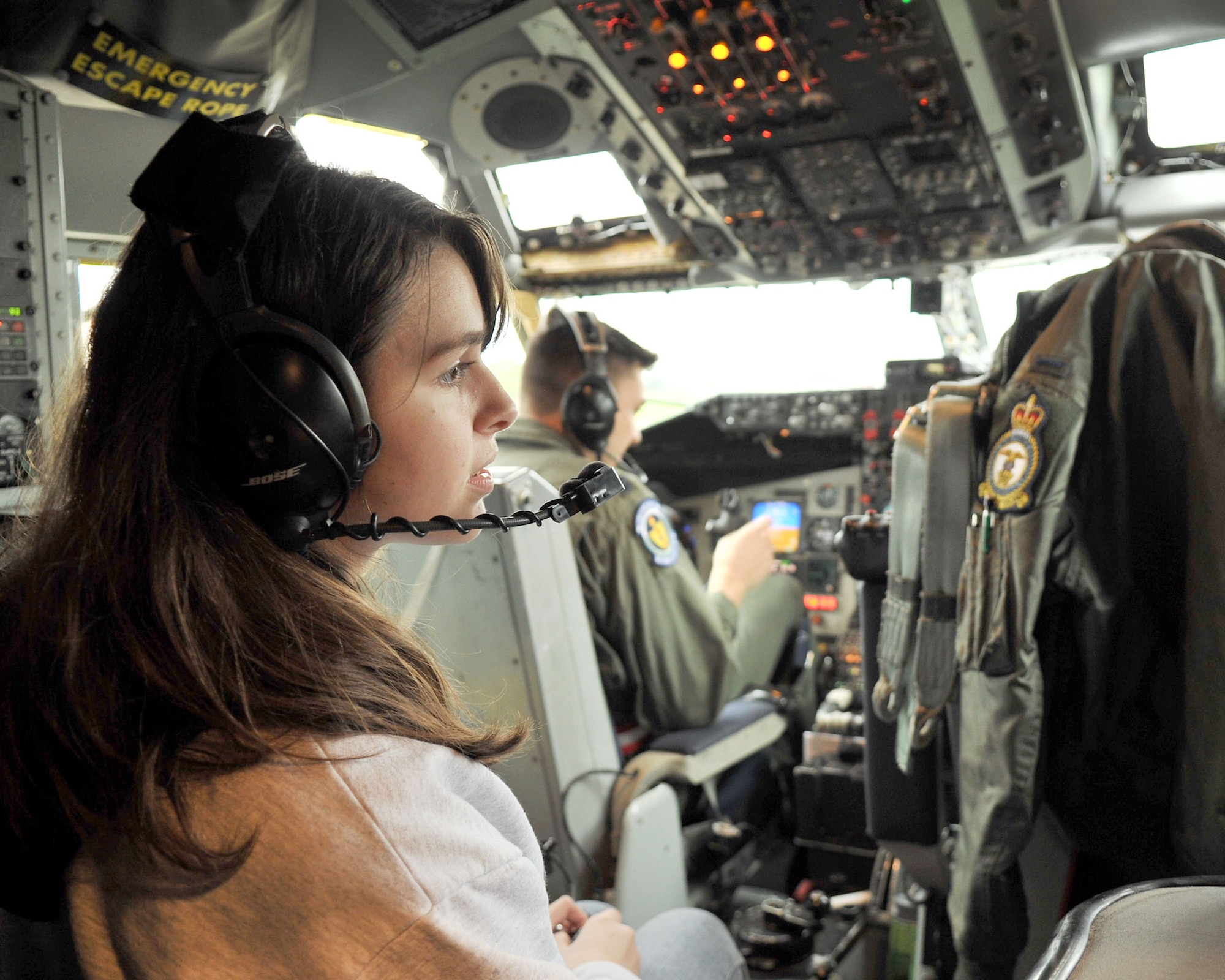 RAF MILDENHALL, England – Air Force Junior Reserve Officer Training Corps cadet Megan Jumper, daughter of Master Sgt. Brian Jumper, 352nd Special Operations Group, looks out the windows while in the flightdeck of a KC-135 Stratotanker here May 3, 2012. Fourteen cadets from RAF Lakenheath High School received a tour and orientation flight which aimed to give them a behind-the-scenes look into Air Force operations. (U.S. Air Force photo/Senior Airman Jerilyn Quintanilla)