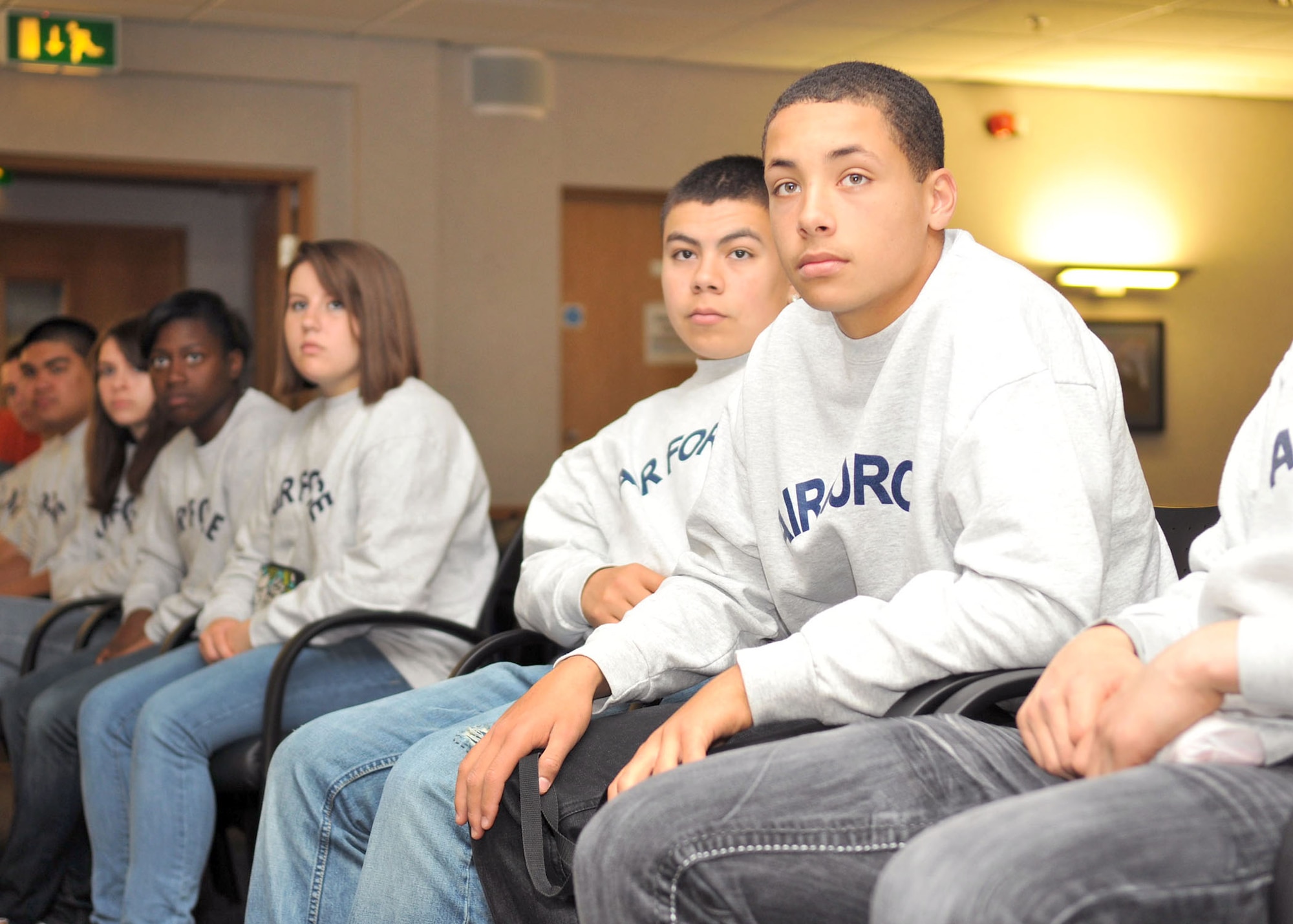 RAF MILDENHALL, England – Air Force Junior Reserve Officer Training Corps cadets listen to a pre-flight briefing in the 100th Operations Group auditorium here May 3, 2012. On their visit to the 100th OG, the cadets received a 100th Air Refueling Wing mission brief, sat in on a pre-flight briefing with the aircrew and flew on board a KC-135 Stratotanker during a refueling mission. (U.S. Air Force photo/Senior Airman Jerilyn Quintanilla)