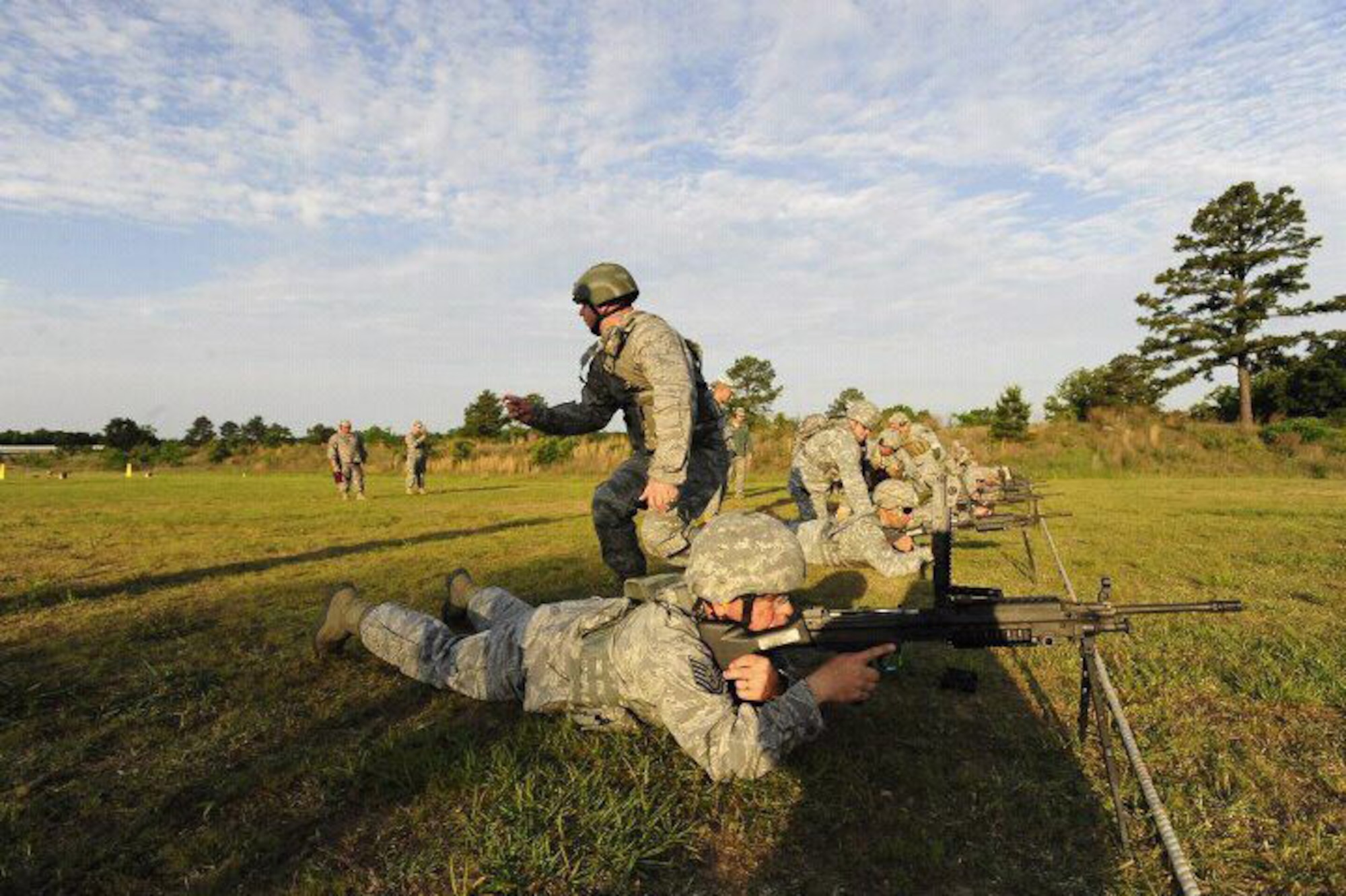 Machine Gun Team Match, in the prone Tech. Sgt. Warren Jones, standing Master Sgt. Edward Stefik. (photo by Arkansas Guard)   