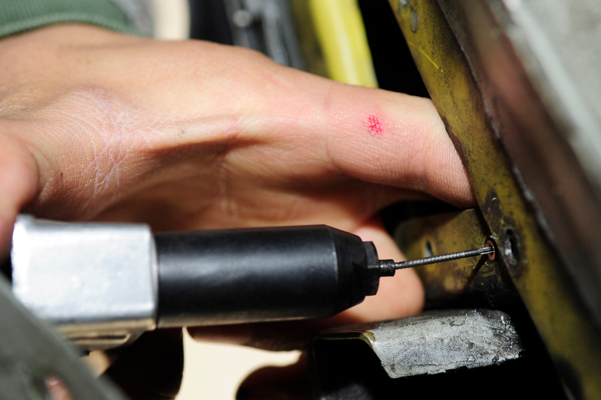 RAF MILDENHALL, England – Senior Airman Vincent Salinas, 100th Maintenance Squadron Aircraft Structural Maintenance journeyman, replaces a nut plate in a KC-135 Stratotanker here May 3, 2012. The replacement of a nut plate helps to prevent future wear and tear on the aircraft. (U.S. Air Force photo/Senior Airman Ethan Morgan)