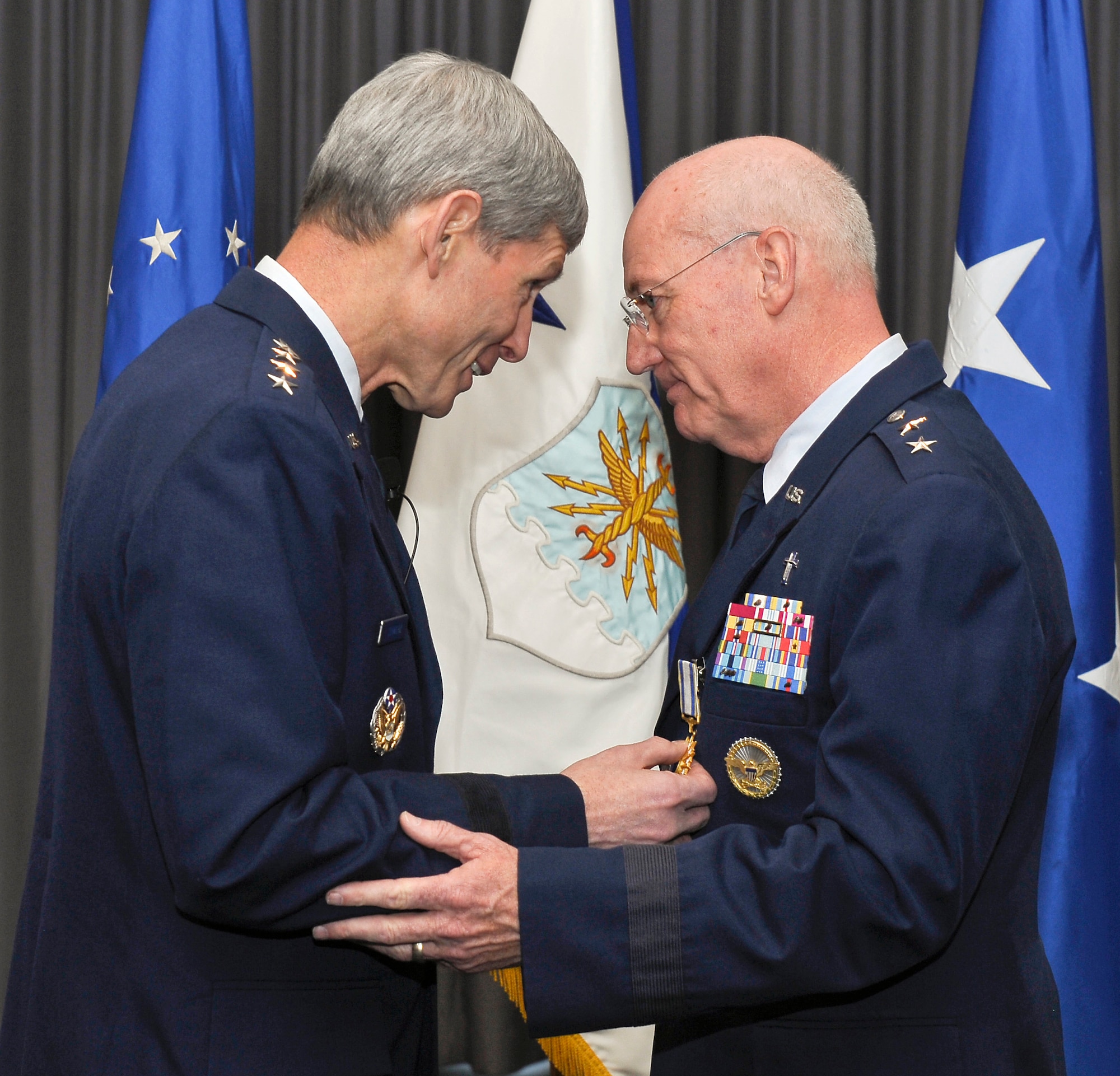Air Force Chief of Staff Gen. Norton Schwartz congratulates Maj. Gen. Cecil Richardson during his retirement ceremony April 30, 2012, at Joint Base Anacostia-Bolling, D.C.  Richardson was the Air Force Chief of Chaplains at the time of his retirement.  (U.S. Air Force photo/Michael J. Pausic)