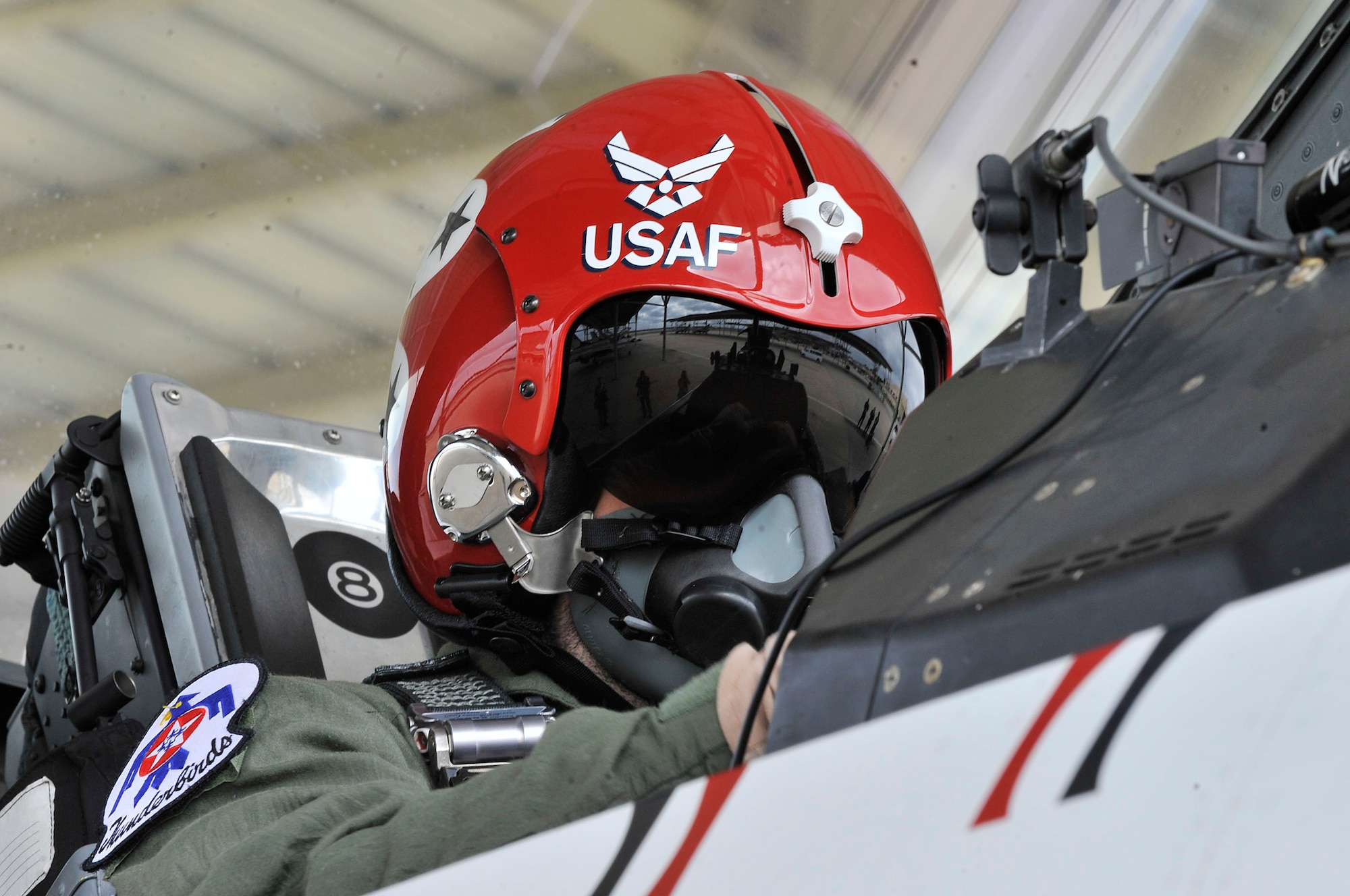 Nick McCormac, Item newspaper reporter, prepares for takeoff at Shaw Air Force Base, S.C., May 3, 2012. U.S. Air Force Capt. Michael Fisher, U.S. Air Force Air Demonstration Squadron "Thunderbirds" advanced pilot/narrator, later presented McCormac with a 9G pin for his ability to withstand the force during the flight. The Thunderbirds are participating in the Shaw Air Expo May 5 and 6.(U.S. Air Force photo by Airman Nicole Sikorski/Released)
