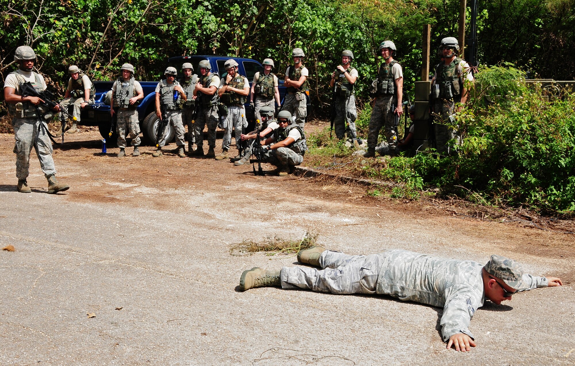 ANDERSEN AIR FORCE BASE, Guam-- Members of the 644th Combat Communications Squadron train on entry control point procedures, vehicle search and apprehension during Exercise Dragon Thunder April 21. Forward operating base Dragon Hill is the location for Dragon Thunder, an exercise where the 644 CBCS train and test their capabilities in a bare-base environment. (U.S. Air Force photo by Airman 1st Class Marianique Santos)