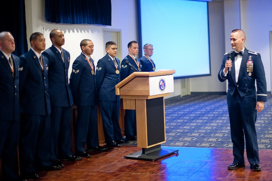 YOKOTOA AIR BASE, Japan -- Col. Bill Knight, 374th Airlift Wing commander, gives closing remarks during the Airman Leadership School Class 12-Delta graduation ceremony at Yokota Air Base, Japan, May 3, 2012. (U.S. Air Force photo/Osakabe Yasuo)
