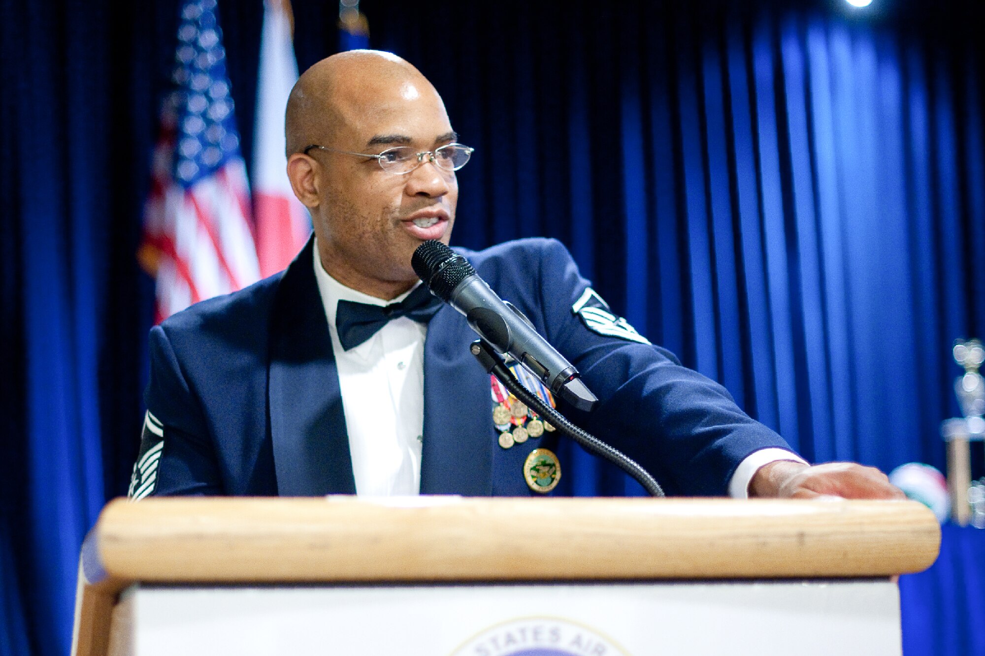 YOKOTA AIR BASE, Japan -- Senior Master Sgt. Vincent Burrell, United States Forces Japan, speaks during the Airman Leadership School Class 12-Delta graduation ceremony at Yokota Air Base, Japan, May 3, 2012. During his speech, Burrell spoke on many of the issues affecting today's Air Force. (U.S. Air Force photo/Osakabe Yasuo)