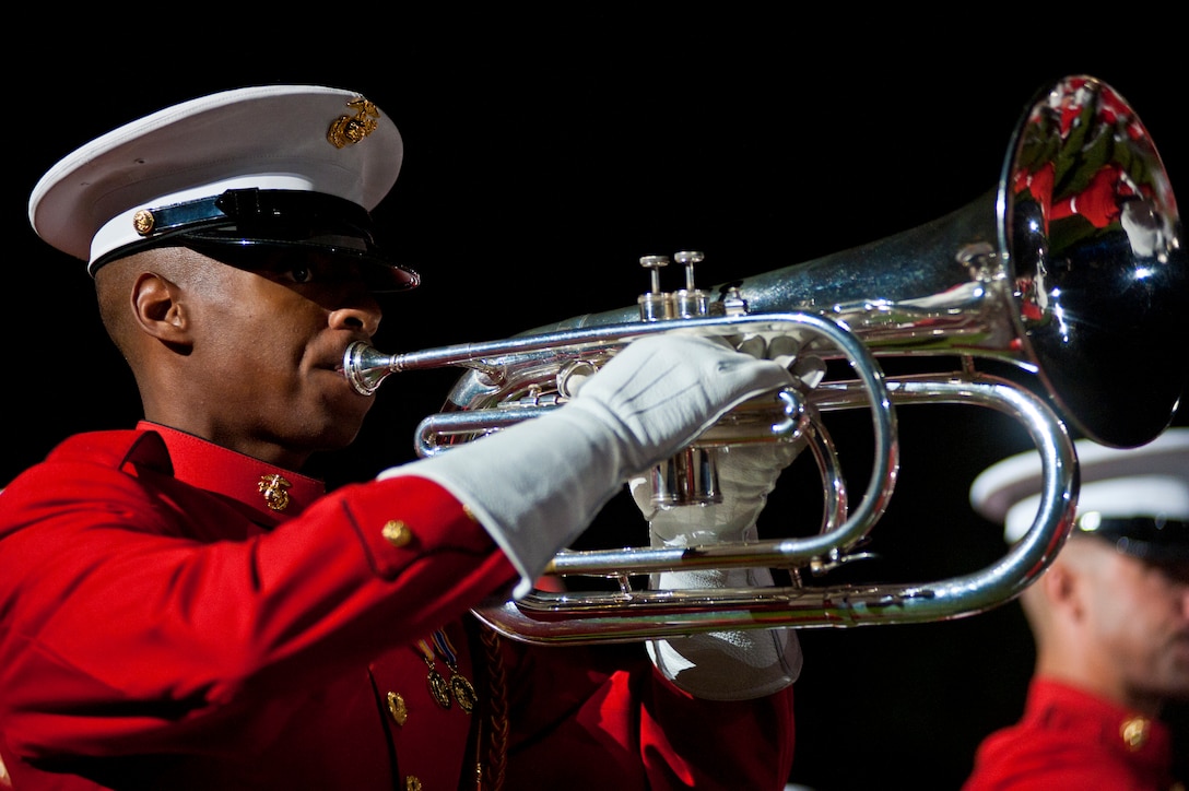 Cpl. Lawrence Terry, Marine Drum & Bugle Corps baritone bugler, performs during a Friday Evening Parade at Marine Barracks Washington May 4.