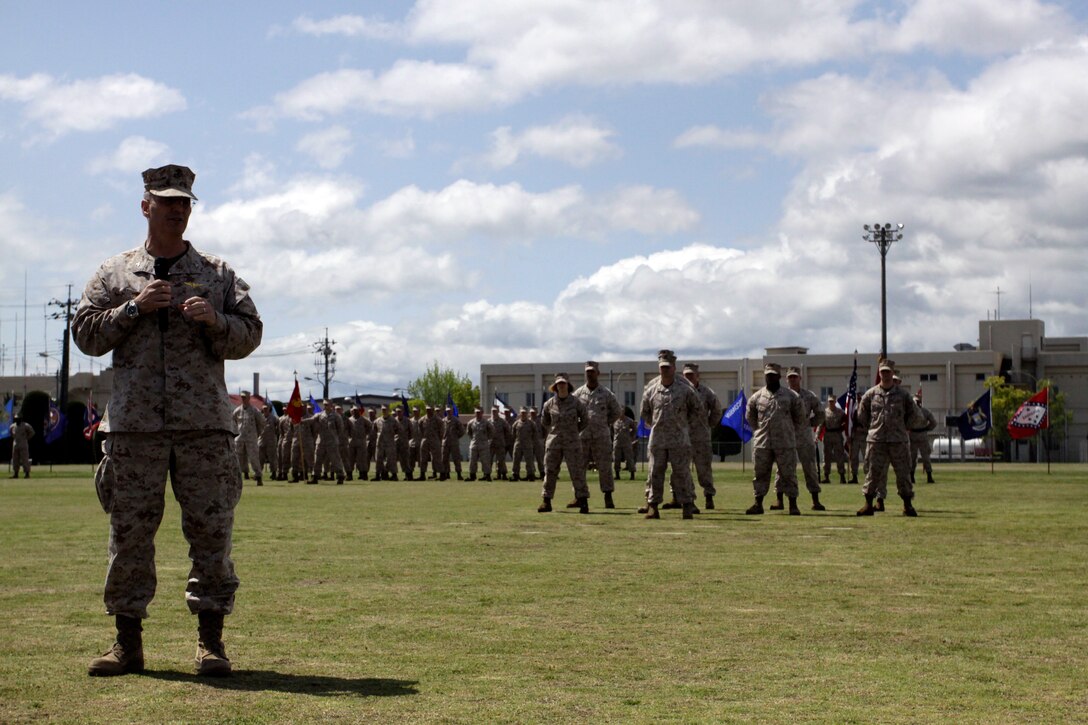 Col. Christopher J. Mahoney, Marine Aircraft Group 12 commanding officer, speaks to all those attending the realignment ceremony of Marine Wing Support Squadron 171 from Marine Wing Support Group 17 to MAG-12 on the parade deck here, May 4, 2012. The realignemnt was done as part of the Marine Corps wide drawdown, but will not degrade the strength of MWSS-171.