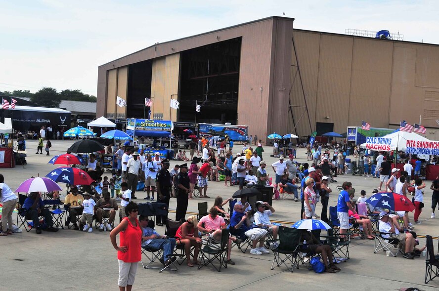 Crowds gather around for the 2012 Shaw Air Expo held at Shaw Air Force Base, S.C., May 5, 2012. The Expo was full of events for children, parents and the plane lovers. There were more than 18 aerial acts to include the U.S. Air Force Thunderbirds, the U.S. Army Golden Knights and numerous vintage World War II aircraft. (U.S. Air Force photo by Airman 1st Class Ashley L. Gardner/ Released)