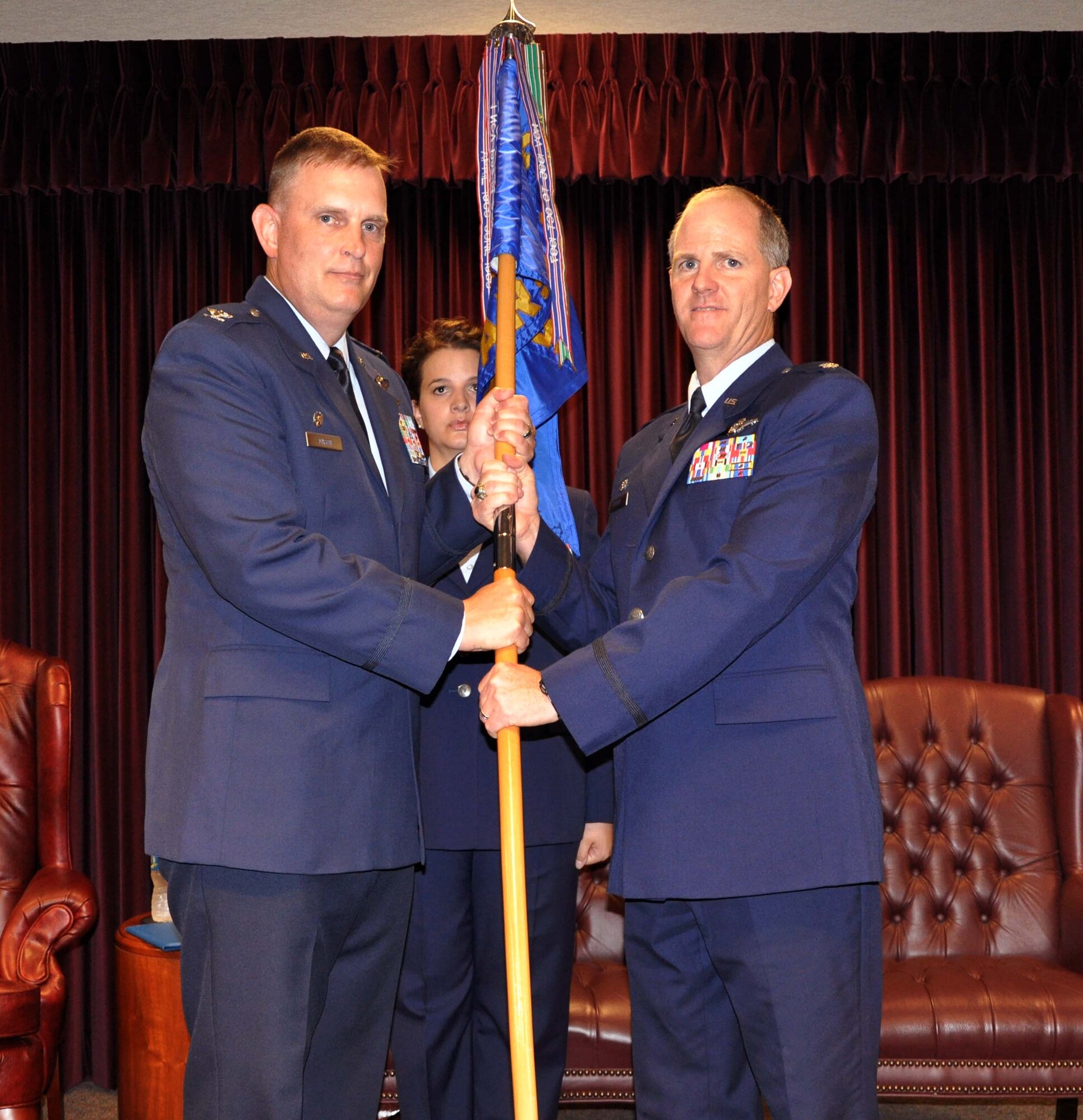 Col. William H. Mason, commander, 931st Air Refueling Group, presents the 18th Air Refueling Squadron guidon to Lt. Col. Eric A. Vitosh, commander, 18th Air Refueling Squadron, during a change of command ceremony at McConnell Air Force Base, Kan., May 5, 2012.  Vitosh assumed command of the 18 ARS, replacing outgoing commander, Lt. Col. Anthony P. Brusca.  (U.S. Air Force photo by 1st Lt. Zach Anderson)