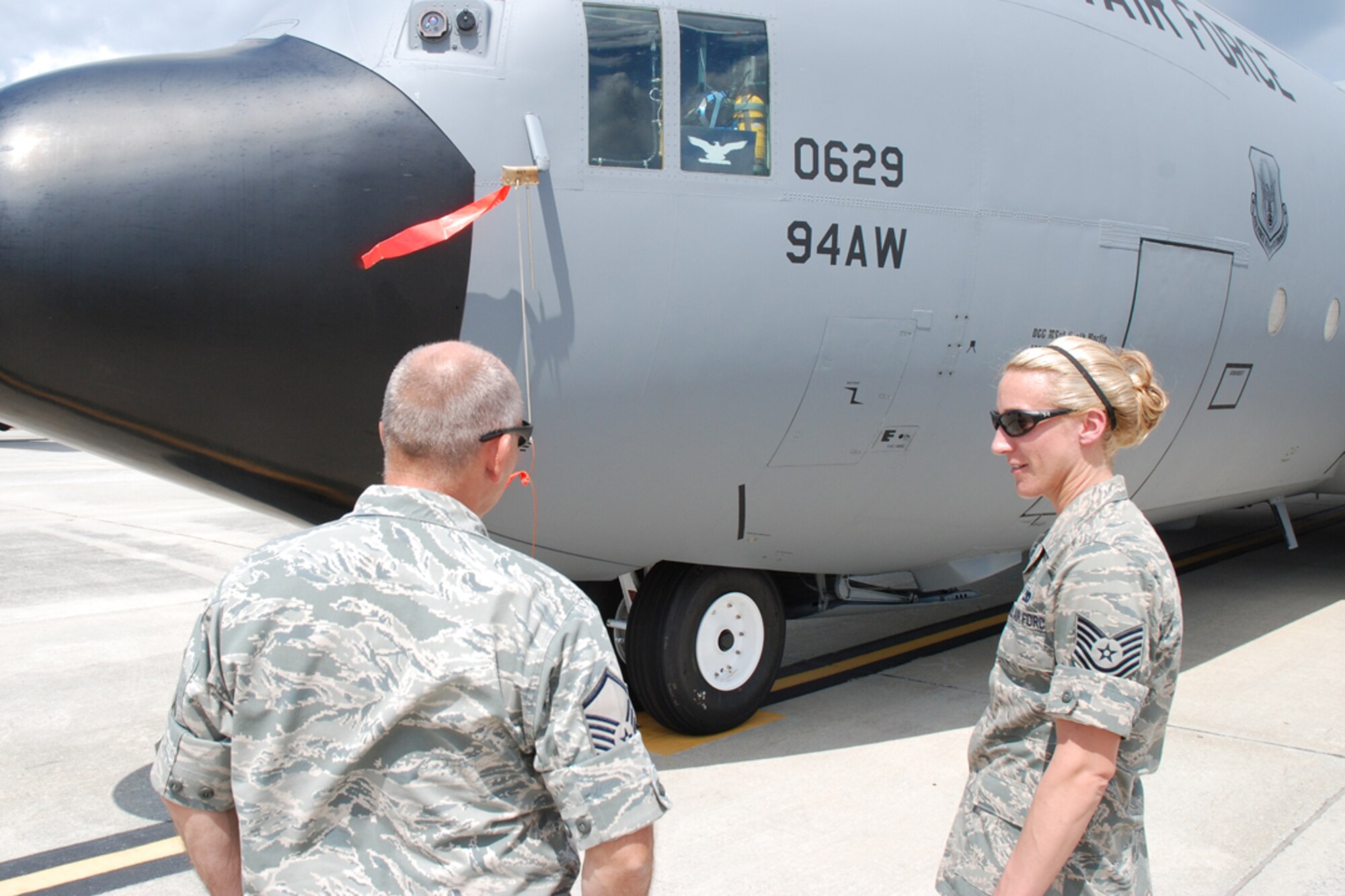 Tech. Sgt. Karie Contreras, 94th Aircraft Maintenance Squadron C-130 crew chief, will soon embark on her first deployment with the 94th Airlift Wing. She has taken great care in preparing her family for their time apart and how they will maintain contact with each other. (photo by Senior Airman Spencer Gallien)
