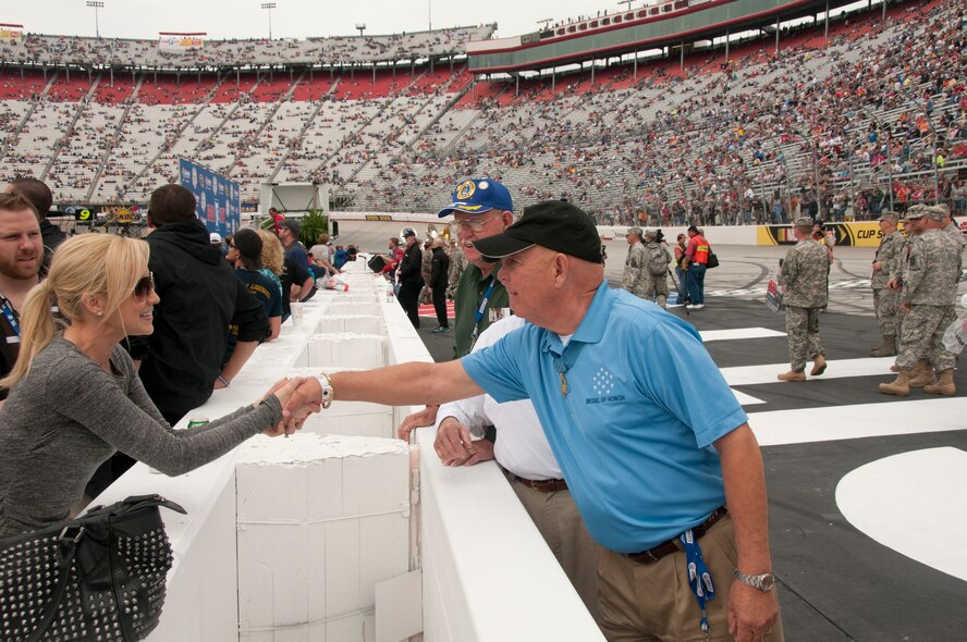 Country singer Kellie Pickler thanks Medal of Honor recipient Gary Littrell for his service and sacrifice at Bristol Motor Speedway on March 18, 2012.  Members of the Armed Services were on hand for the Food City 500 NASCAR race.