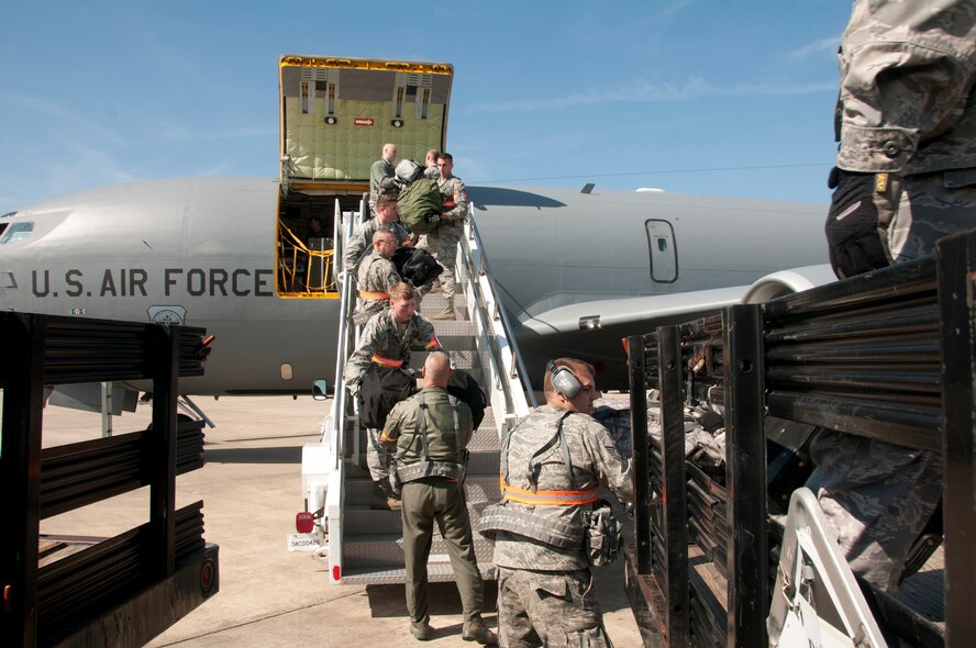 Members of the 134th Air Refueling Wing unload gear from their KC-135 at The Air National Guard Combat Readiness Center, Gulfport MS on February 8, 2012. The 134th ARW performed an Operational Readiness Exercise February 8-12, 2012 in Gulfport.