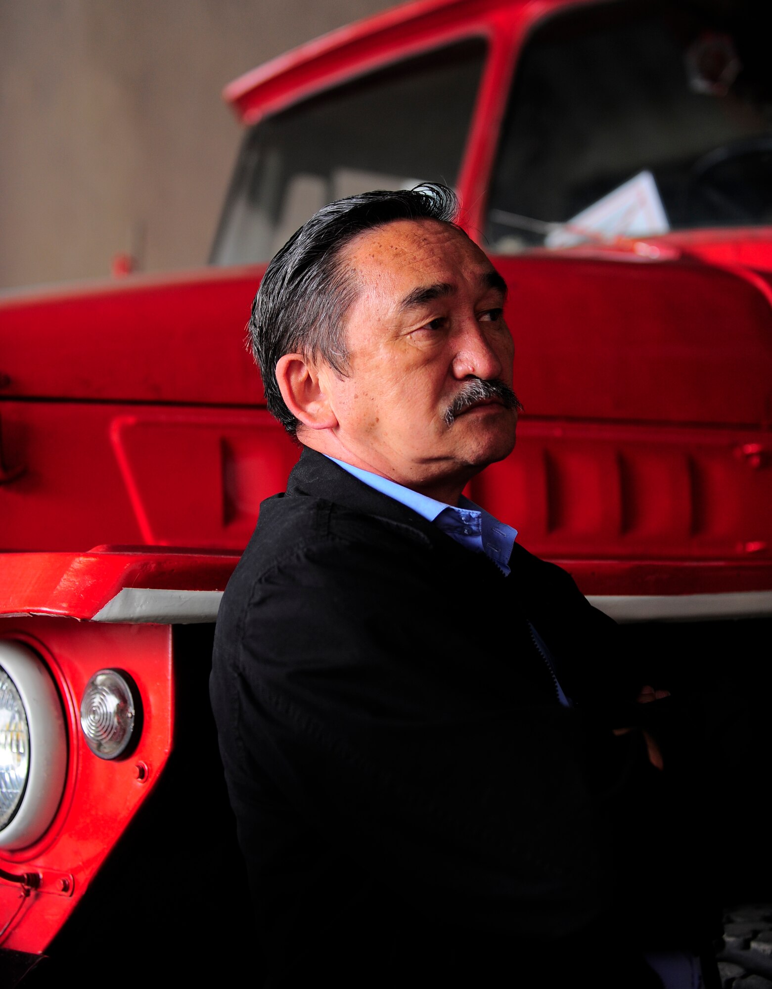 Zaynidin Seidaliev listens to questions from the newly assigned 376th Expeditionary Civil Engineer Squadron fire fighters from the Transit Center at Manas April 27, 2012, at Manas International Airport fire department Kyrgyzstan. Seidaliev is the Manas International Airport fire department chief. (U.S. Air Force photo/Staff Sgt. Angela Ruiz)