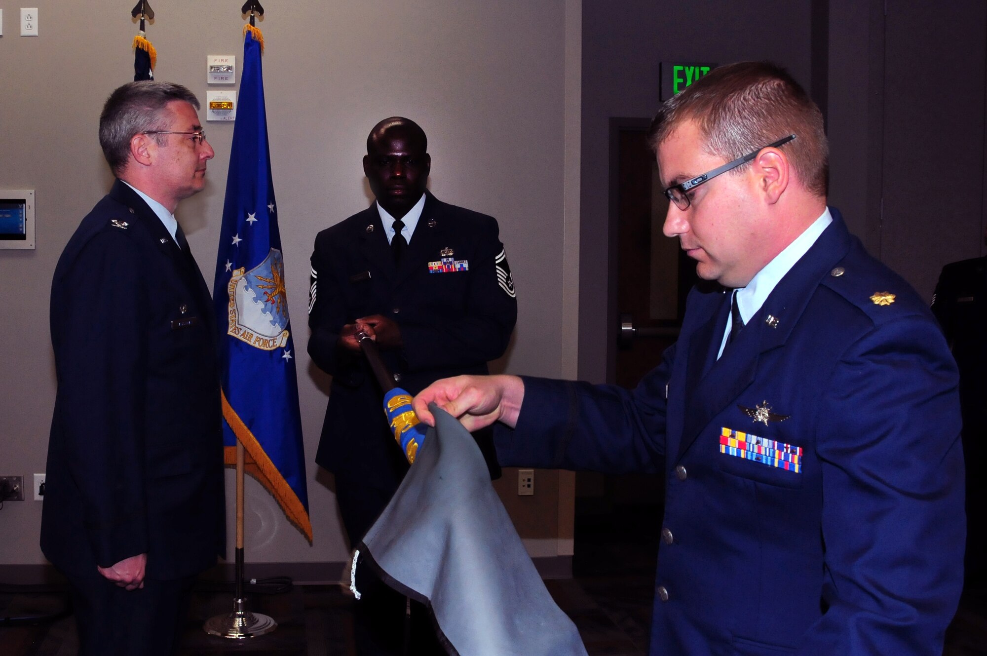 Maj. Cynthia Marcello assumed command of the 310th Force Support Squadron from the outgoing commander, Lt. Col. Kevin Graefe, at a change-of-command ceremony on April 15 at the newly completed Air Reserve Personnel Center at Buckley Air Force Base, Colo. (U.S. Air Force Photo/Staff Sgt. Jeffrey Fitzmorris)