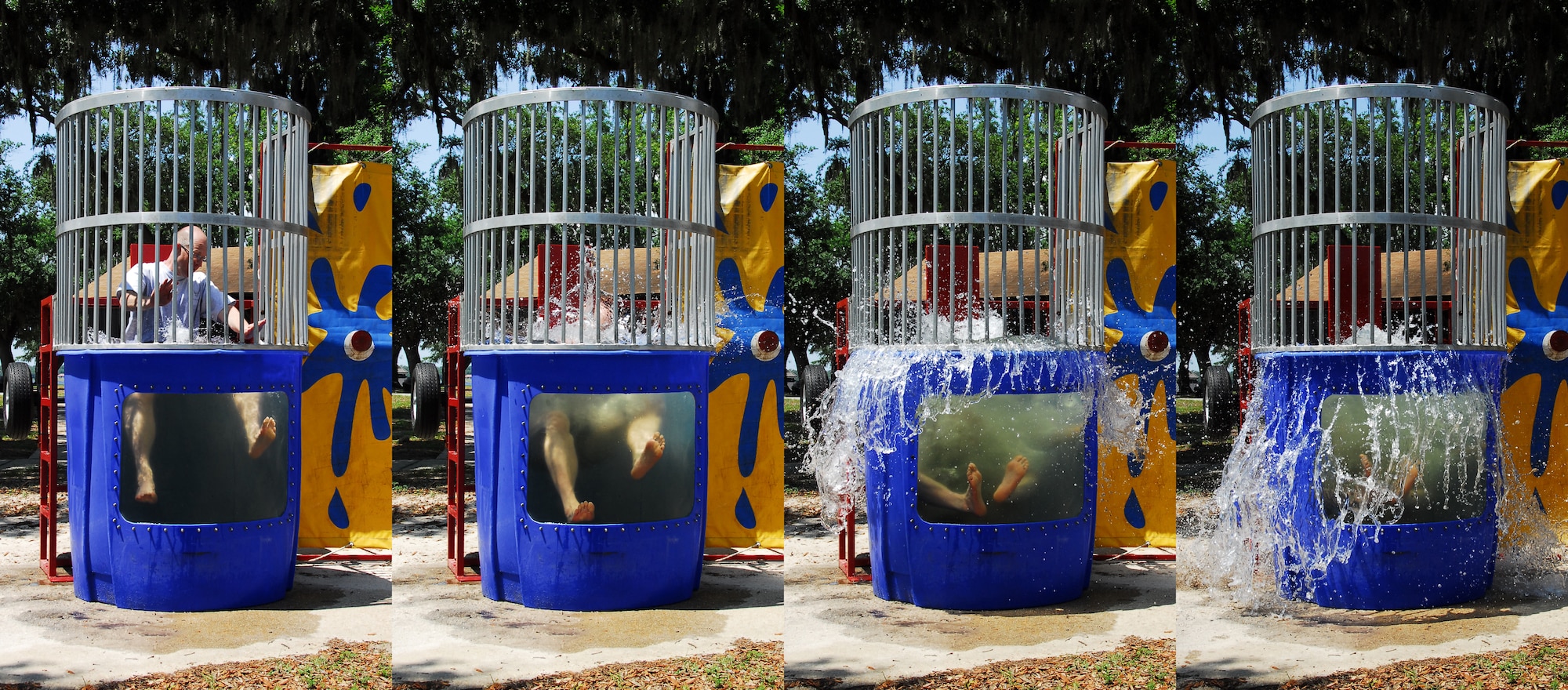 Col. Jay Jensen, 403rd Wing Commander, creates a big splash at the dunking booth during Wing Family Day. Hundreds of members of the 403rd Wing and their family members gathered at Keesler Air Force Base's Marina Park May 5. (U.S. Air Force photo illustration by Tech. Sgt. Jessica Kendziorek)