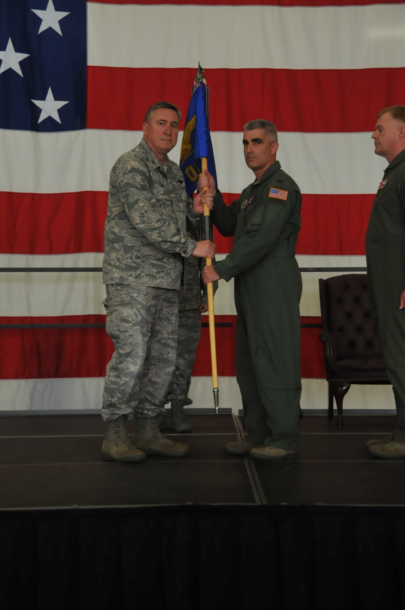 Colonel Keith T. Wesley receives the guidon from Colonel Darrell G. Young, commander of the 934th Airlift Wing.  Col. Wesley assumed command of 934th Operations Group May 6, at the Minneapolis-St. Paul Air Reserve Station, Minn.(U.S. Air Force Photo/Tech. Sgt. Bob Sommer)