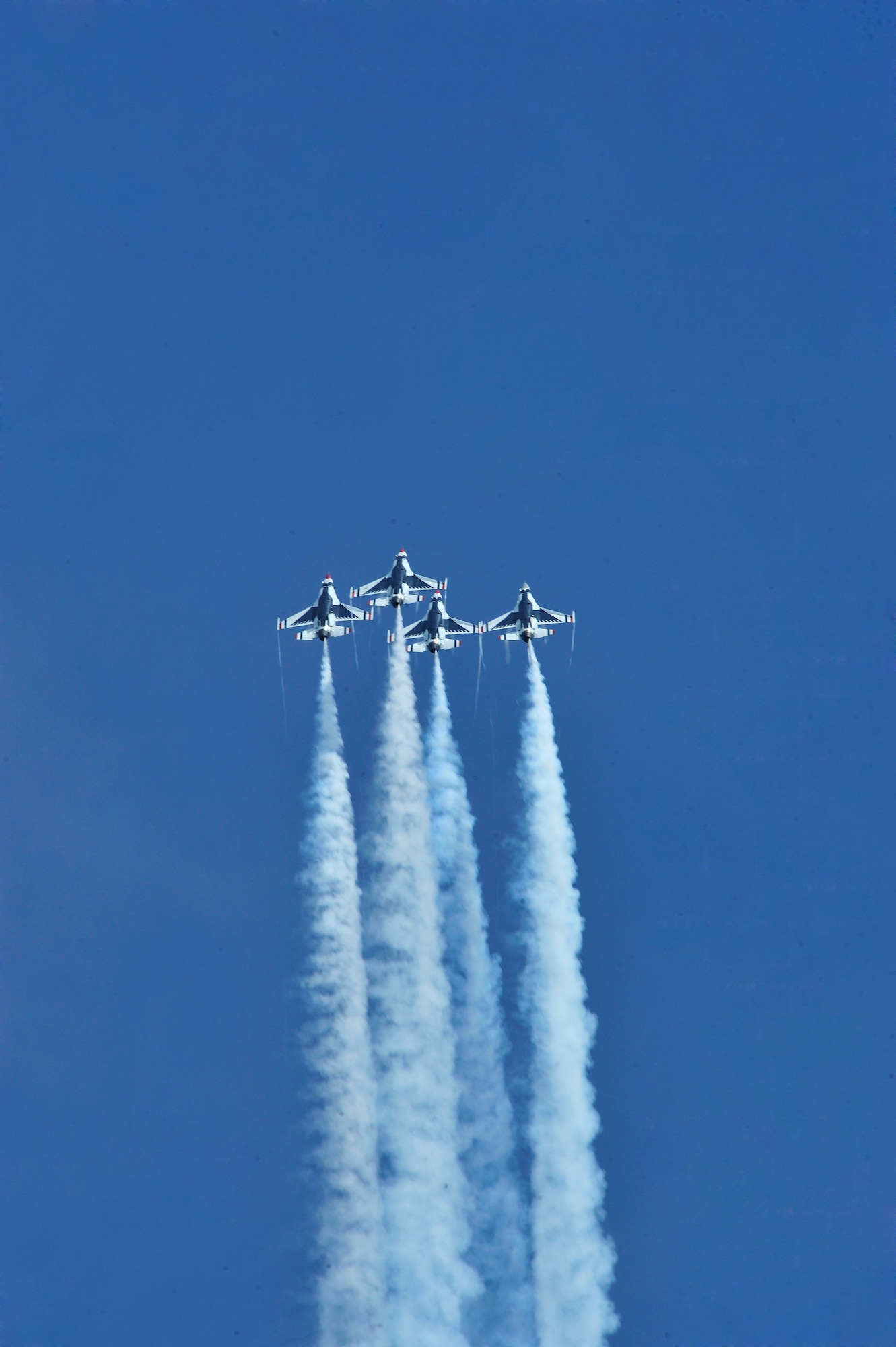 U.S. Air Force Air Demonstration Squadron "Thunderbirds" speed upwards into the sky during a performance at the Shaw Air Expo, Shaw Air Force Base, S.C., May 5, 2012.  The Thunderbirds perform more than 88 air demonstrations each year across the U.S. (U.S. Air Force photo by Airman Nicole Sikorski/Released) 