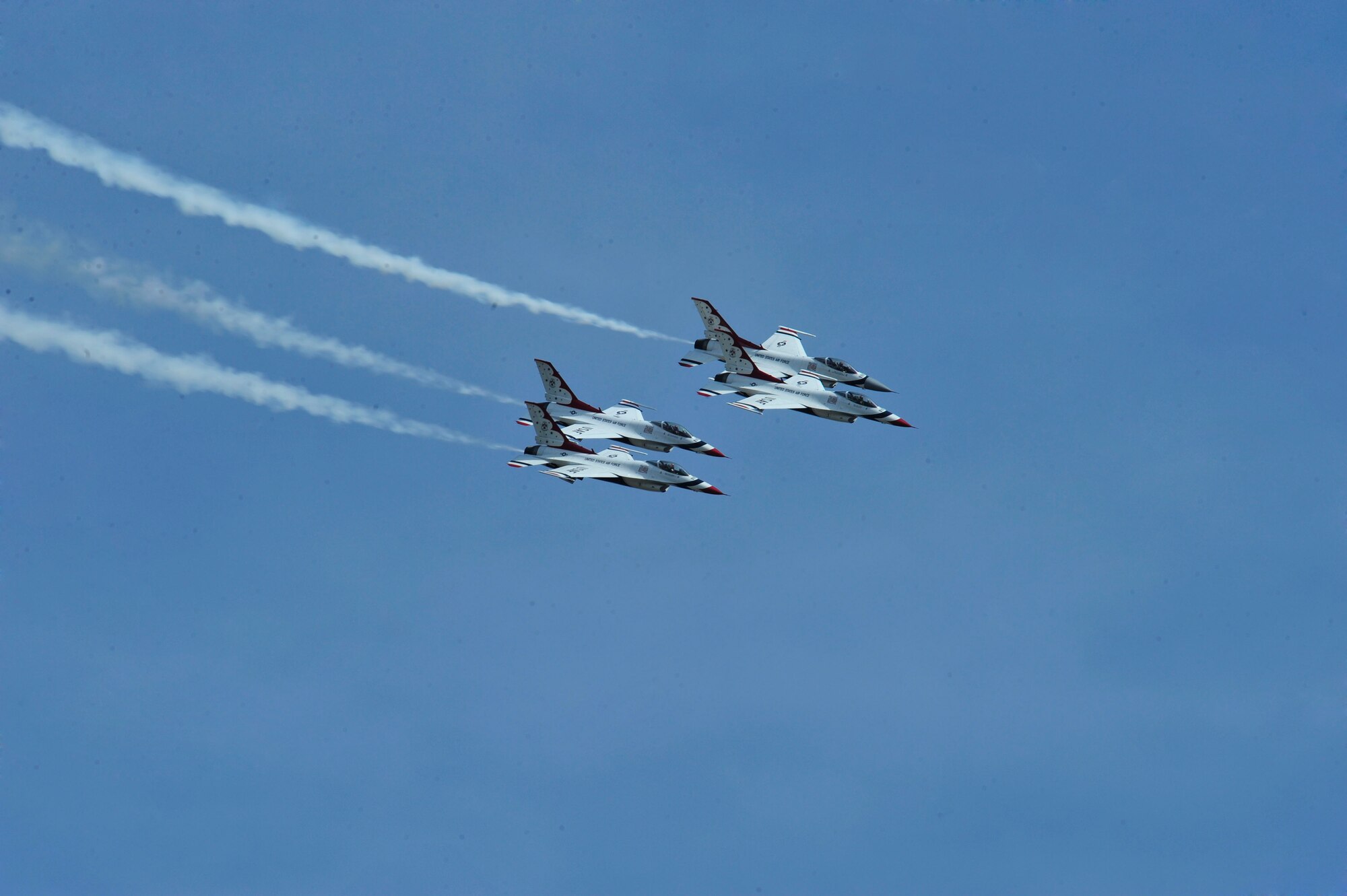U.S. Air Force Air Demonstration Squadron "Thunderbirds" race across the sky during a performance at the Shaw Air Expo, Shaw Air Force Base, S.C., May 5, 2012.  The group is known for their high-flying and tactical maneuvers.  (U.S. Air Force photo by Airman Nicole Sikorski/Released) 
