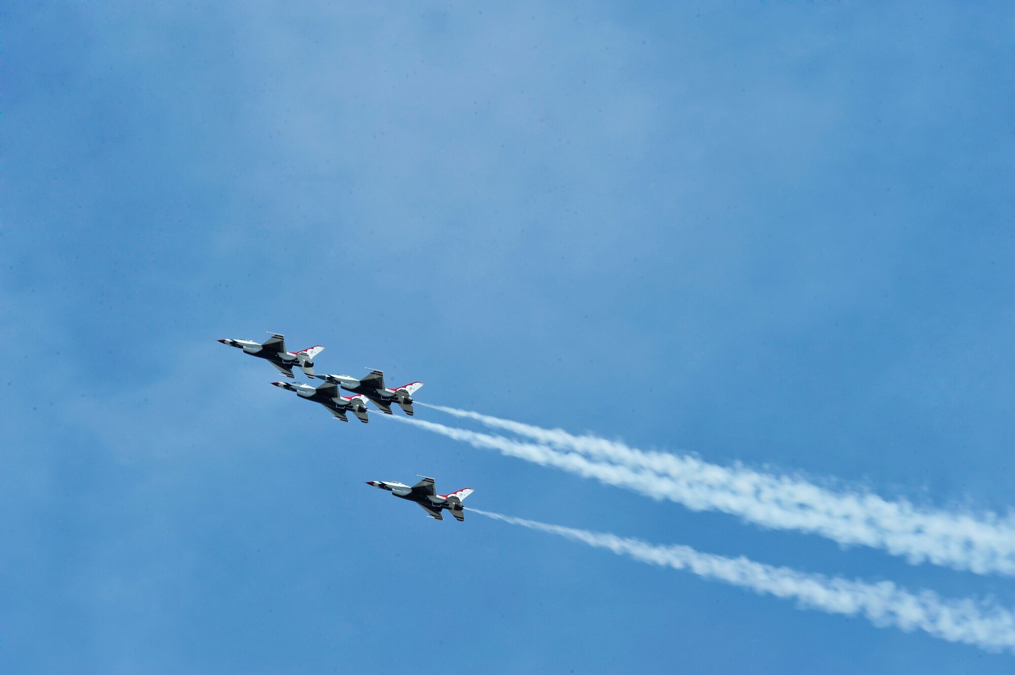 U.S. Air Force Air Demonstration Squadron "Thunderbirds" conduct tactical and difficult maneuvers while participating at the Shaw Air Expo at Shaw Air Force Base, S.C., May 5, 2012.  The Thunderbirds and U.S. Army Golden Knights highlighted the biennial event. (U.S. Air Force photo by Airman Nicole Sikorski/Released) 