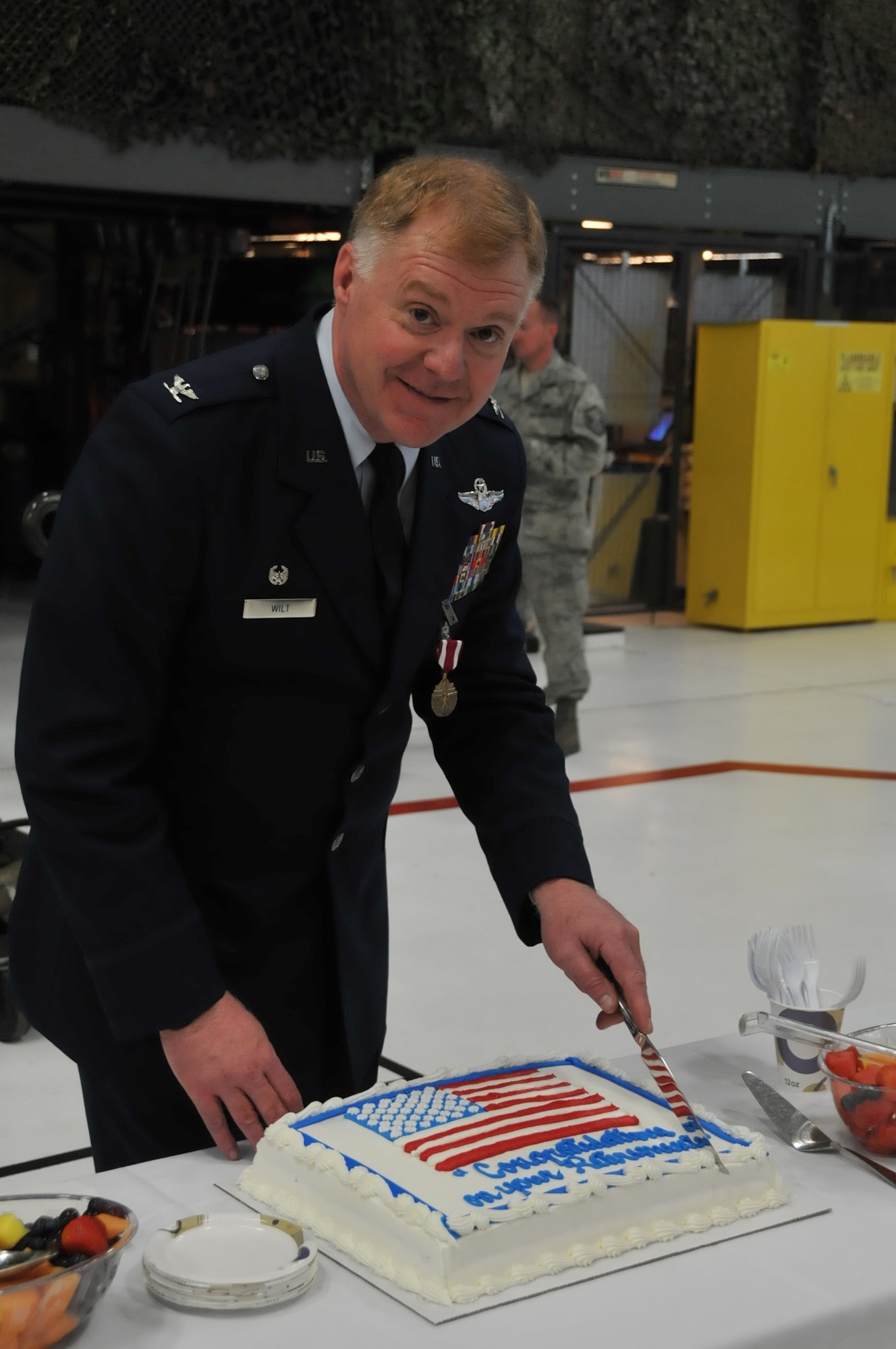 Colonel Ronald A. Wilt, 934th Operations Group commander, cuts the cake at his retirement ceremony May 5, 2012. He retires after 32 years of service from his last assignment at the Minneapolis-St. Paul Air Reseve Station, Minn.(U.S. Air Force photo by Tech Sgt. Bob Sommer/Released)
