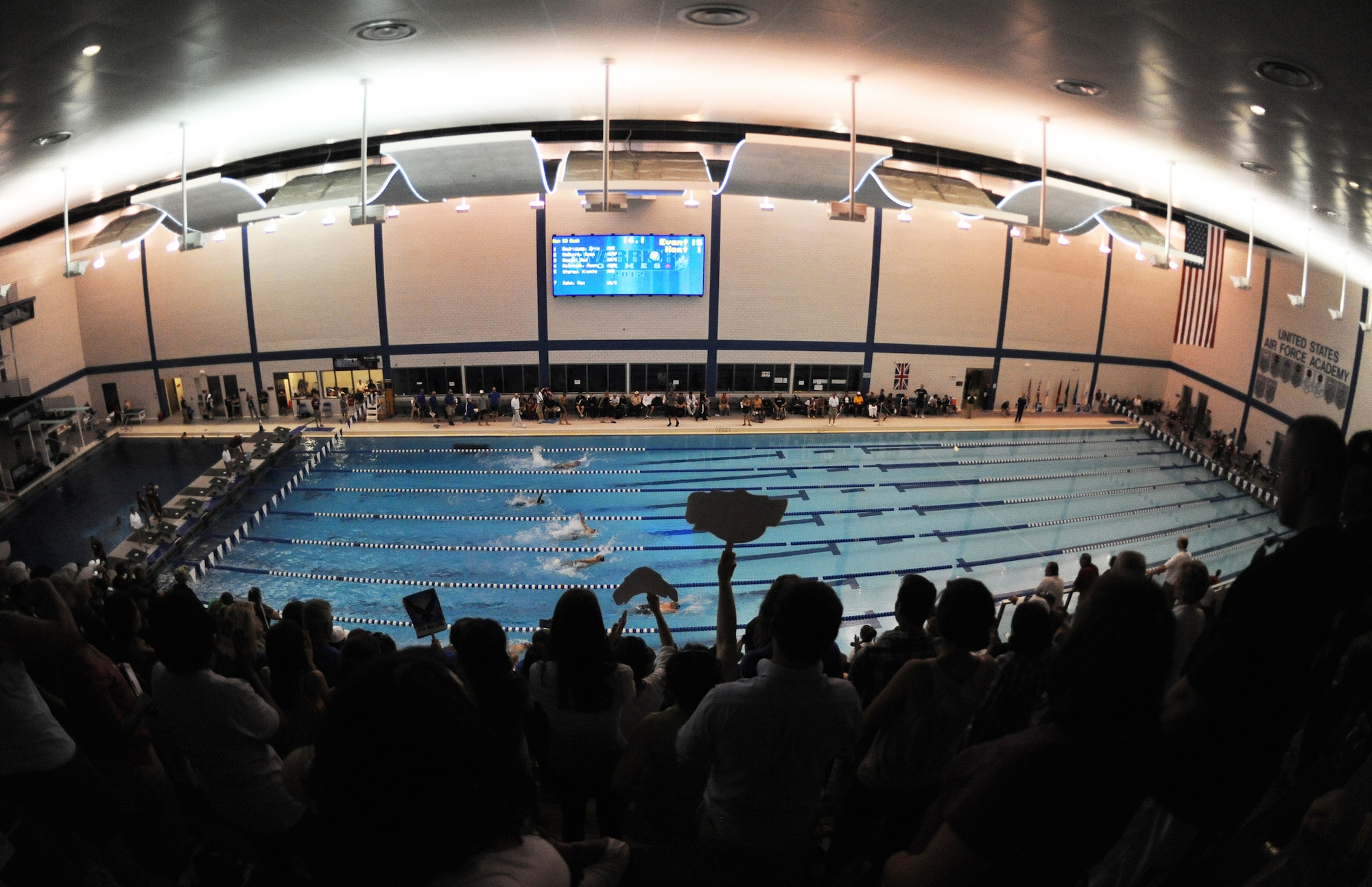 The crowd cheer as athletes take part in a swimming competition during Warrior Games 2012 at the U.S. Air Force Academy in Colorado Springs, Colo., May 5, 2012. (U.S. Air Force photo by Val Gempis/Released)