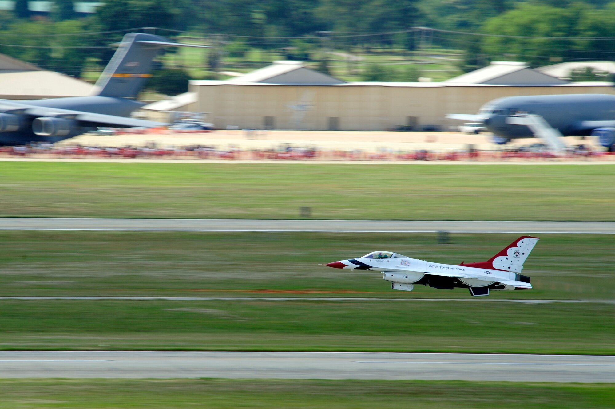 A U.S. Air Force Thunderbirds jet takes off from the Shaw Air Force Base, S.C. flightline to begin his performance at the Shaw Air Expo May 5, 2012. Thousands of visitors came to Shaw for the air show May 5 and 6 to see the numerous static displays and watch the Thunderbirds perform. (U.S. Air Force photo by Senior Airman Daniel Phelps/Released)