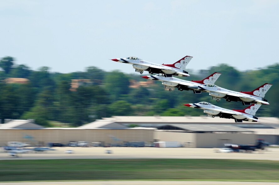 U.S. Air Force Thunderbirds, the elite Air Force Demonstration team, takes off from the Shaw Air Force Base, S.C. flightline to begin their performance at the Shaw Air Expo May 5, 2012. The 2012 Shaw Air Expo featured numerous static Air Force and U.S. Army displays and several aerobatic performers, which were highlighted by the Thunderbirds. The Shaw Air Expo took place on May 5 and 6. (U.S. Air Force photo by Senior Airman Daniel Phelps/Released)