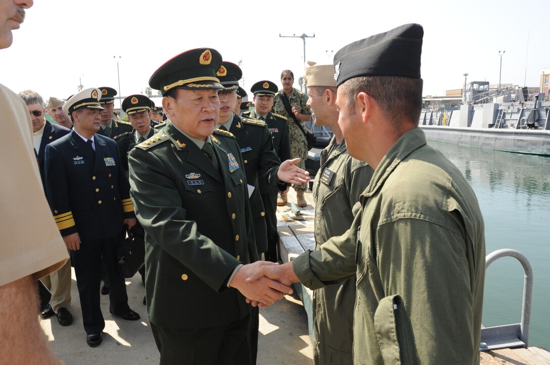 Chinese Minister of National Defense Gen. Liang Guanglie greets U.S. Navy Petty Officer 1st Class Jesse Blair, an aviation machine's mate, during a visit to Naval Amphibious Base Coronado, Calif., May 5, 2012. 