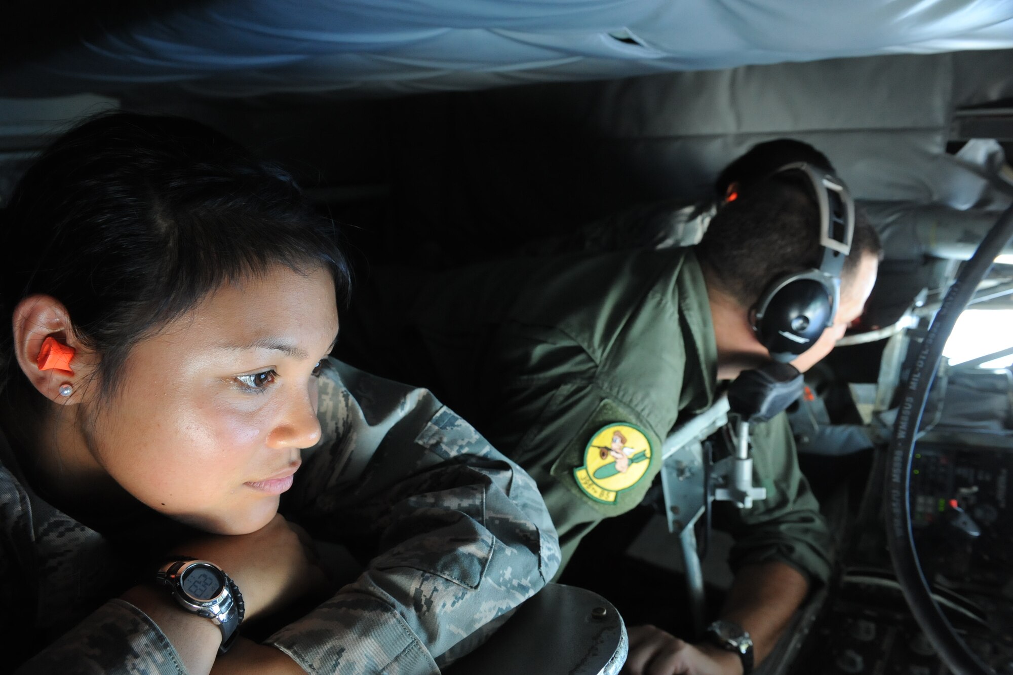 Jeanine Avila, a Reserve Officer Training Corps cadet from U.S. Air Force ROTC Detachment 175 at the University of Hawaii watches Senior Master Sgt. Dicky Hunt, 96th Air Refueling Squadron superintendent, refuel a C-17 Globemaster III May 4 at Joint Base Pearl Harbor-Hickam, Hawaii. The flight, which featured 7 cadets from both the U.S. Army and U.S. Air Force, served as an incentive flight for the cadets while simultaneously providing them a glimpse of the operational military.
(U.S. Air Force photo by Staff Sgt. Nathan Allen)