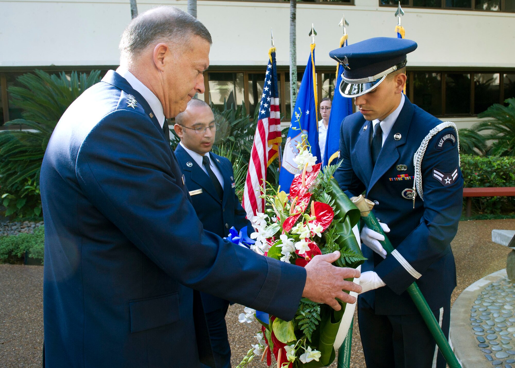 Airman First Class Jonathan Timmons, from the Joint Base Pearl Harbor-Hickam Honor Guard, stands at parade rest during a wreath-laying ceremony, at the Courtyard of Heroes, Headquarters Pacific Air Forces, Joint Base Pearl Harbor Hickam, Hawaii, April 23, 2012. Gen. Gary North, Pacific Air Forces commander and PACAF’s Command Chief Master Sgt. Brooke McLean joined the outstanding Airmen to honor those who died at Hickam Field, Dec. 7, 1941. (U.S. Air Force photo/Tech. Sgt. Jerome S. Tayborn)