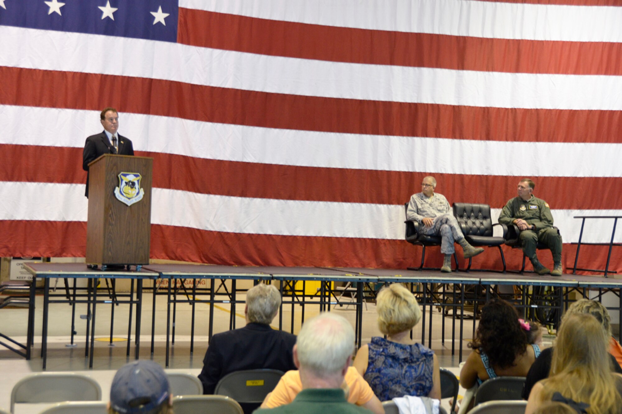 Congressman Phil Gingrey, Georgia’s 11th District, address members, families and friends of the 94th Airlift Wing during a recent deployment departure ceremony at Dobbins Air Reserve Base, Ga. Over 100 94th Airlift Wing members recently deployed to the Middle East to provide personnel and cargo delivery using C-130 aircraft. (U.S. Air Force photo/Master Sgt. James Branch)