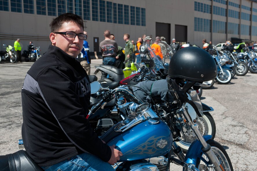 Airman 1st Class Jesus Ortiz, 28th Aircraft Maintenance Squadron crew chief, participates in the motorcycle mentorship ride event at the Pride Hangar at Ellsworth Air Force Base, S.D., April 30, 2012. During the event, 65 riders came together to share knowledge and experiences to promote safe motorcycle riding. (U.S. Air Force photo by Airman 1st Class Zachary Hada/Released)