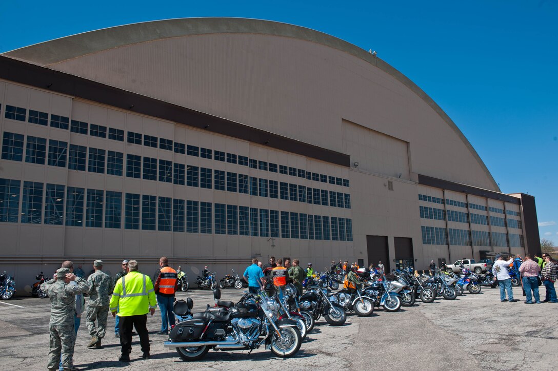 Riders from the base, Box Elder and Rapid City, S.D., gather together to participate in a motorcycle mentorship ride at the Pride Hangar designed to foster safe motorcycle riding and build camaraderie among riders at Ellsworth Air Force Base, S.D., April 30, 2012. New riders got a chance to meet with more experienced riders to learn about how to safely operate their motorcycle. (U.S. Air Force photo by Airman 1st Class Zachary Hada/Released)