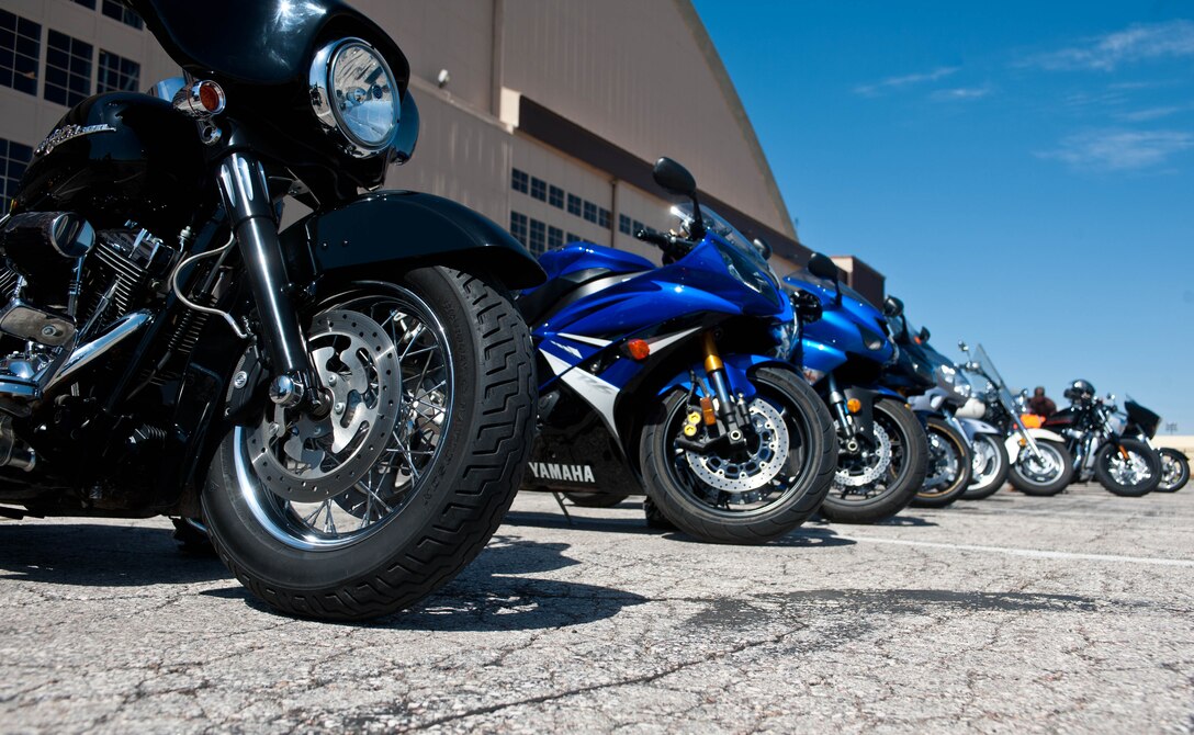 A fleet of motorcycles sits silently prior to the start of a motorcycle mentorship ride to promote safe riding and prevent members from losing their conducted the Pride Hangar at Ellsworth Air Force Base, S.D., April 30, 2012. All participants’ motorcycles were inspected prior to the group ride around Ellsworth and through the Black Hills. (U.S. Air Force photo by Airman 1st Class Zachary Hada/Released)